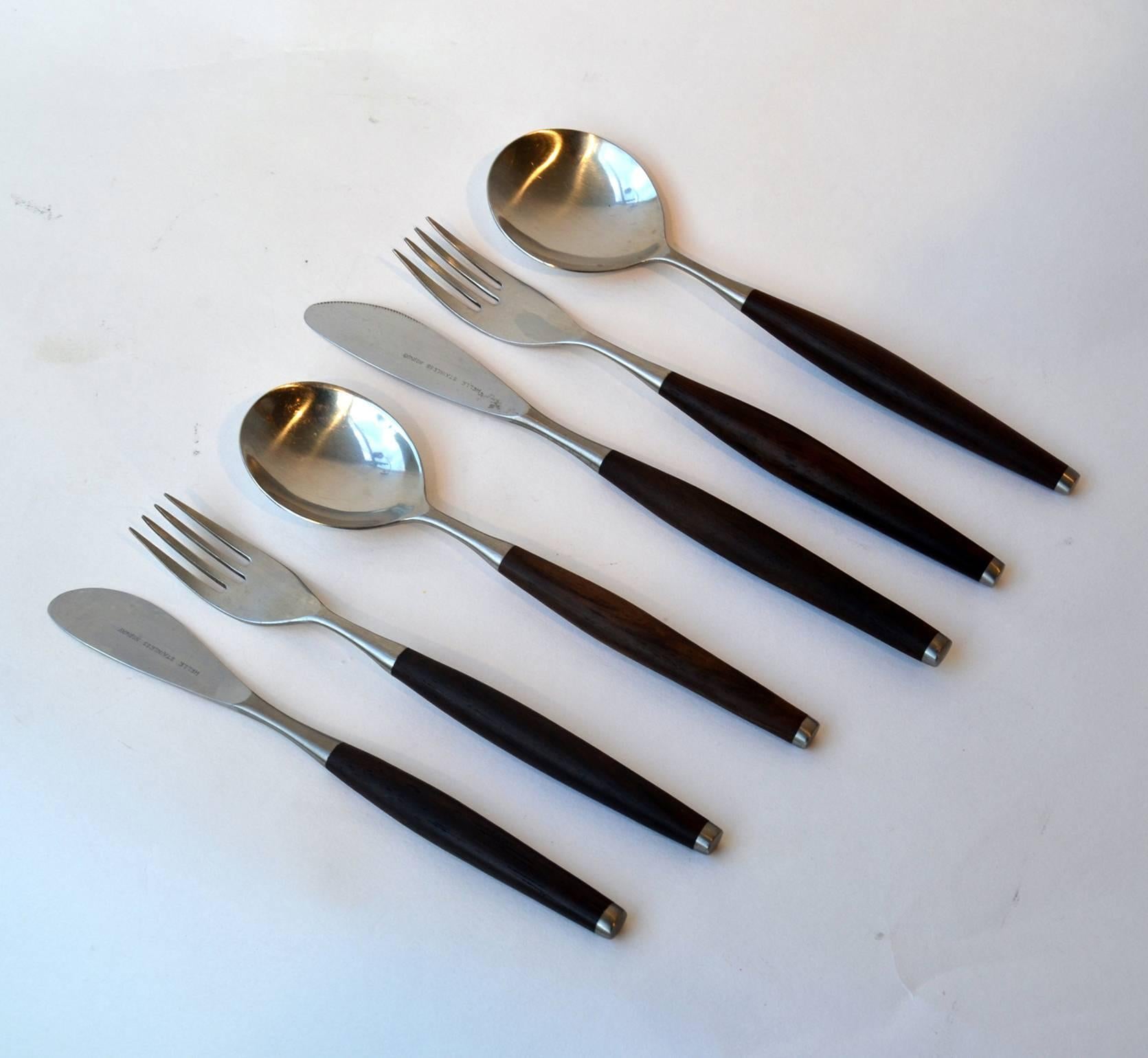 Wallin of Sweden 'Safir' canteen cutlery for six place setting. 46 pieces of Mid-Century flatware in Stainless steel and teak. Six person place settings consisting of, six soup spoons, dinner forks, knifes and desert spoons, six breakfast forks,