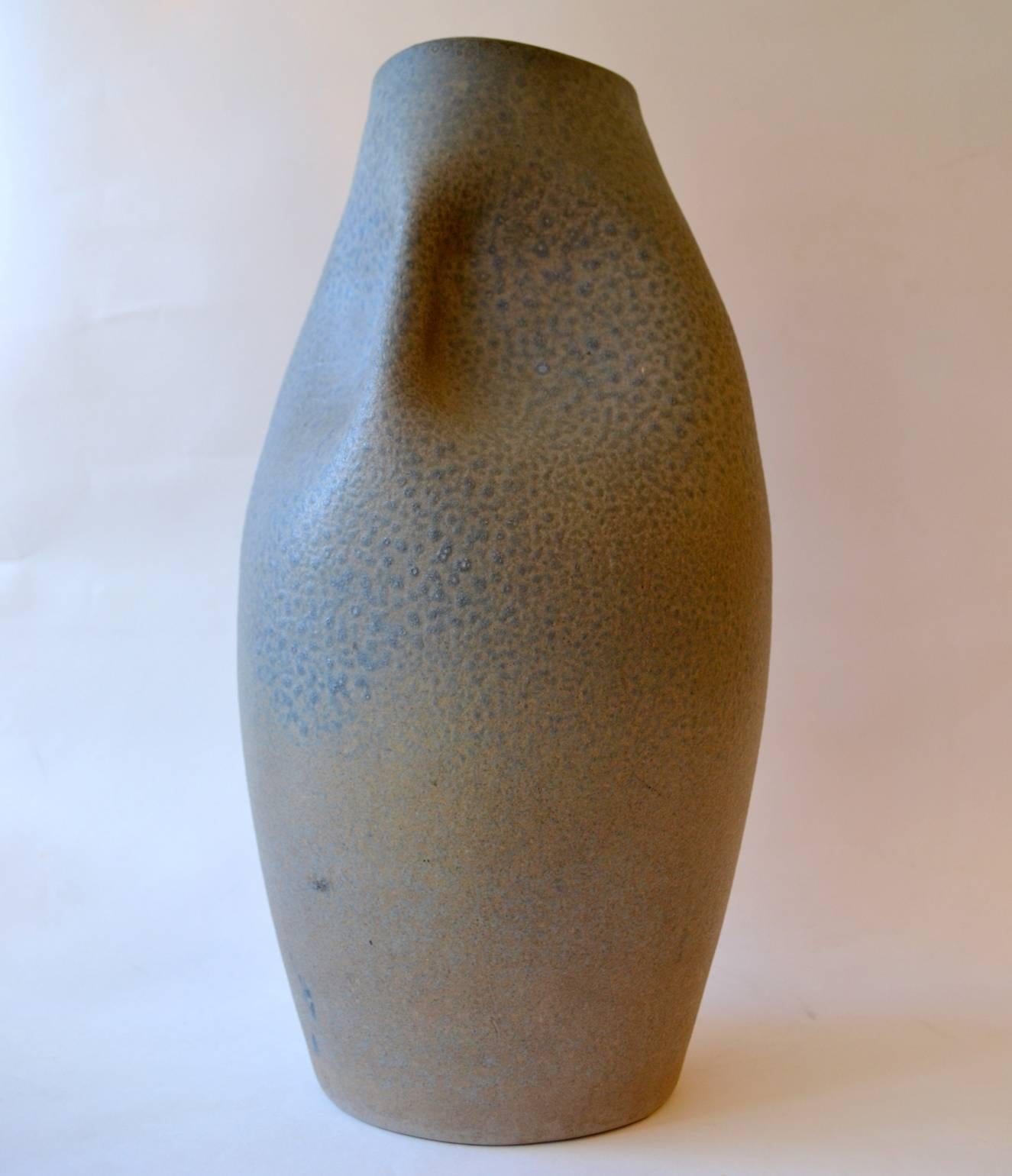 Large sculptural hand thrown and hand manipulated vase with a subtle blue textured glaze, by Bernh Jak Gieriz, Adendorf, Bonn, 1960's Germany. The vase is great as a floor vase or somewhere in the house in a forgotten corner and will draw attention