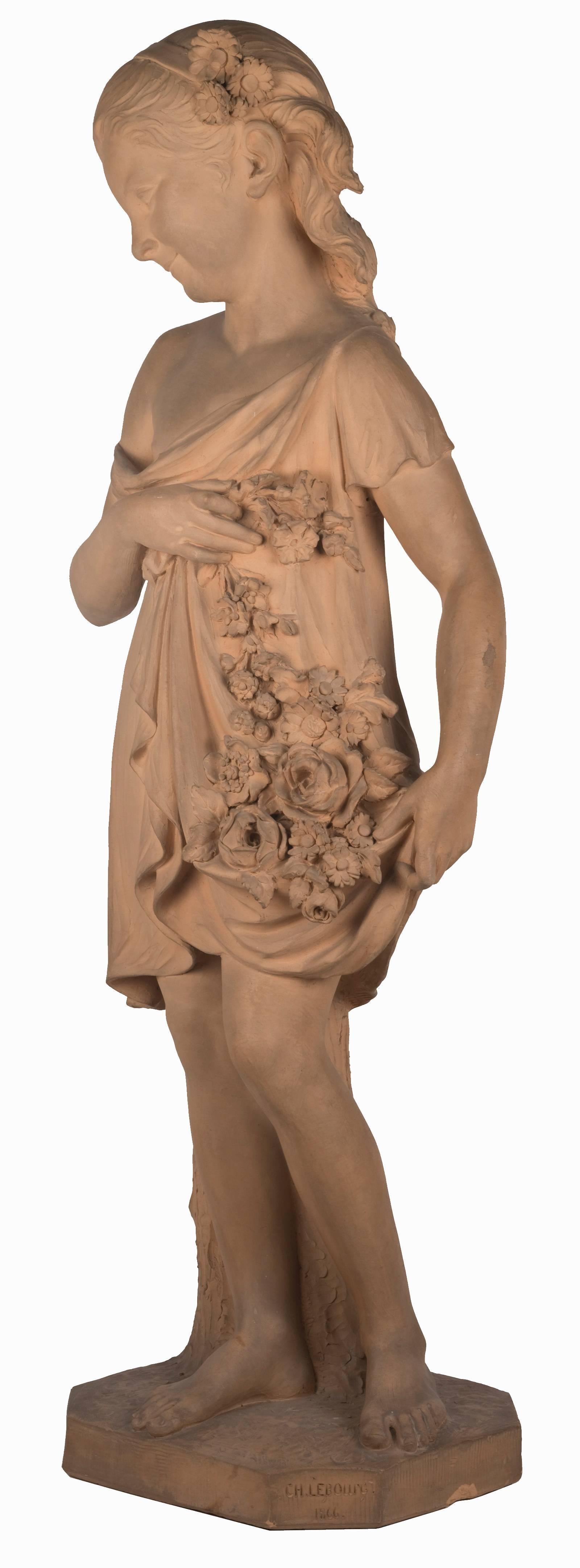 An 19th century French terracotta statue of a young girl, the standing figure in delicately carved drapery leaning against a tree stump with a garland of flowers at her side. The pedestal is incised, CH. Le Bourg 1866.

Charles Lebourg (1829 -