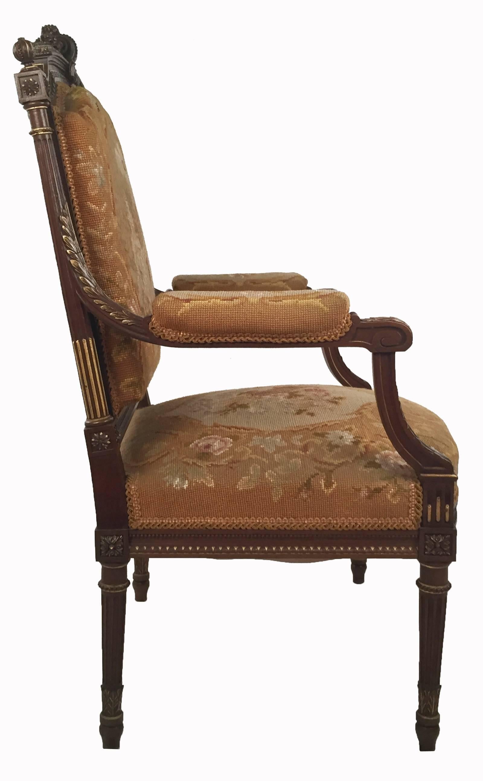 French Set of Louis XVI Style Walnut and Parcel-Gilt Needlepoint-Upholstered Armchairs