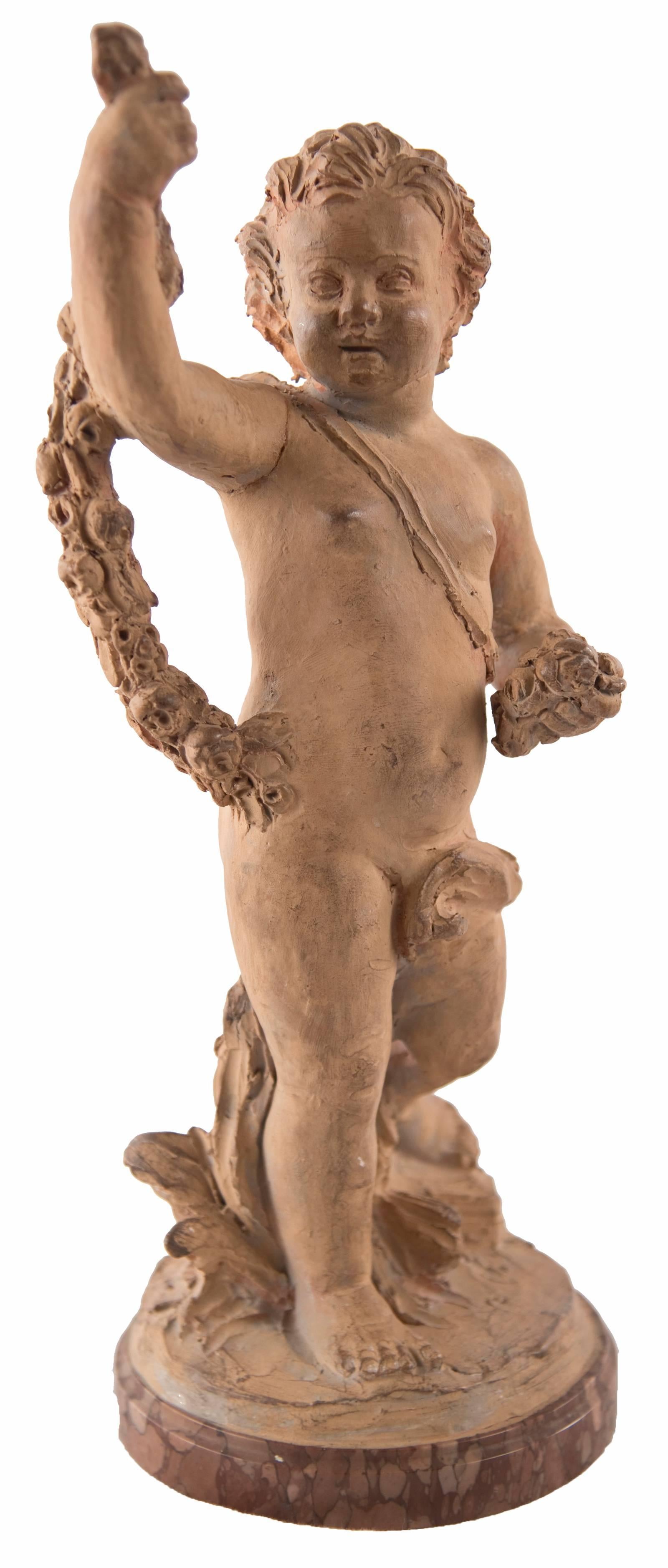 French 18th Century Terracotta Cherub Figurine For Sale