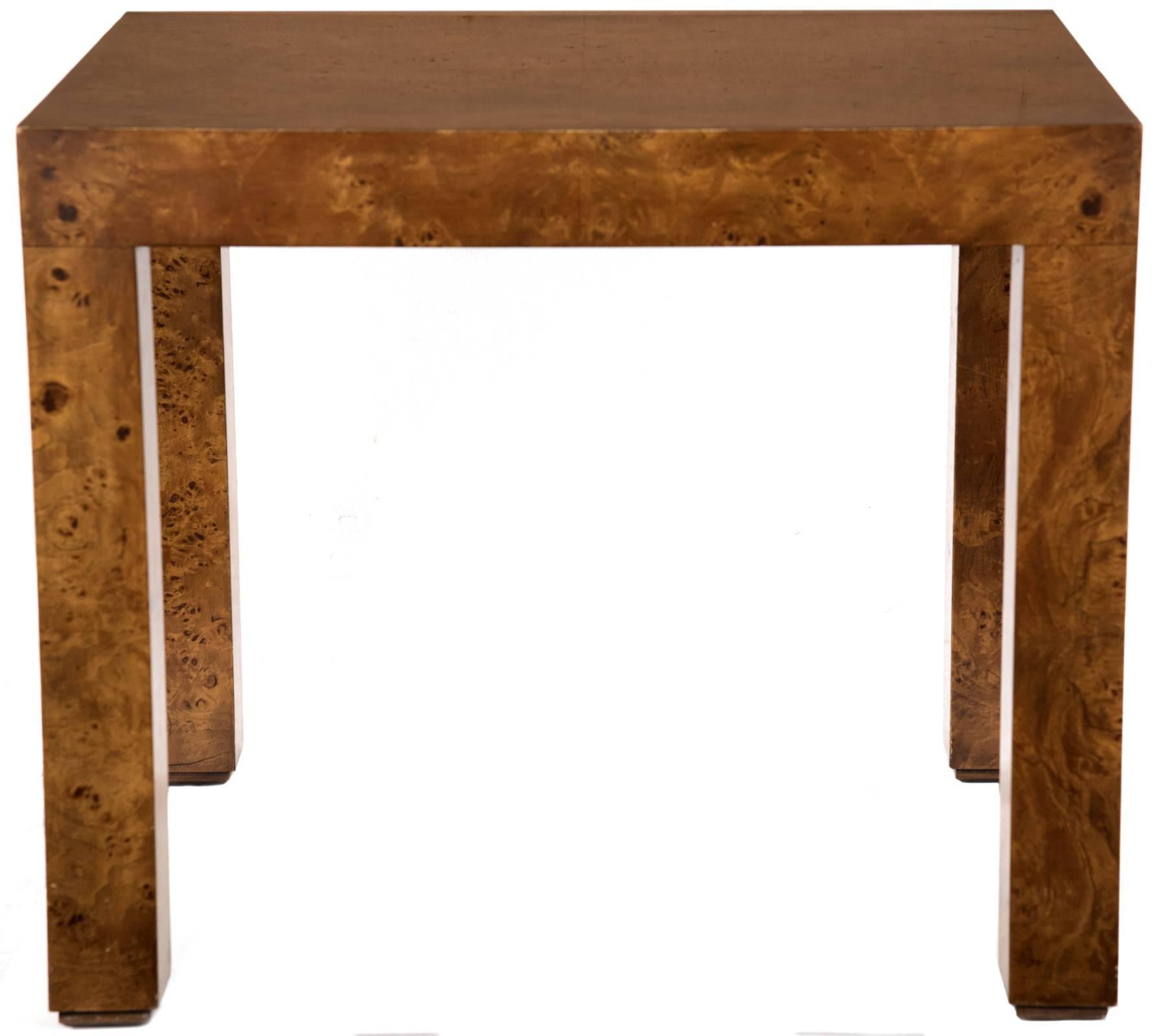 Mid-Century Modern rectangular burl walnut Parsons side table. The Parsons table is one where the square legs have the same width as the tabletop, regardless of its other dimensions.

The Parsons table was created in a furniture design class at