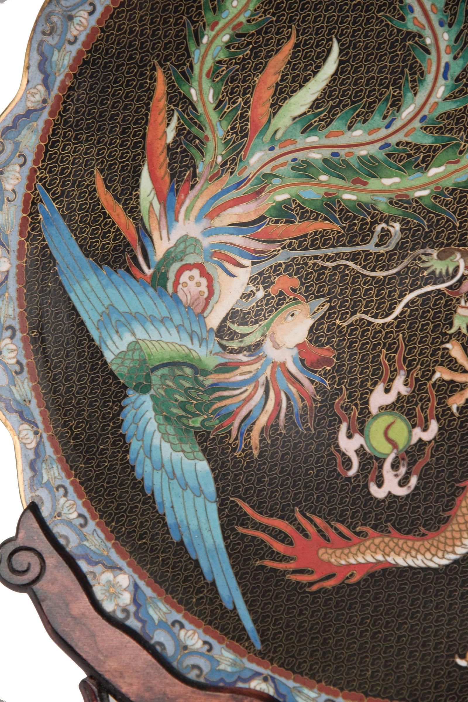 Chinese Cloisonné Enamel 'Dragon and Phoenix' Charger on Ornate Wooden Stand