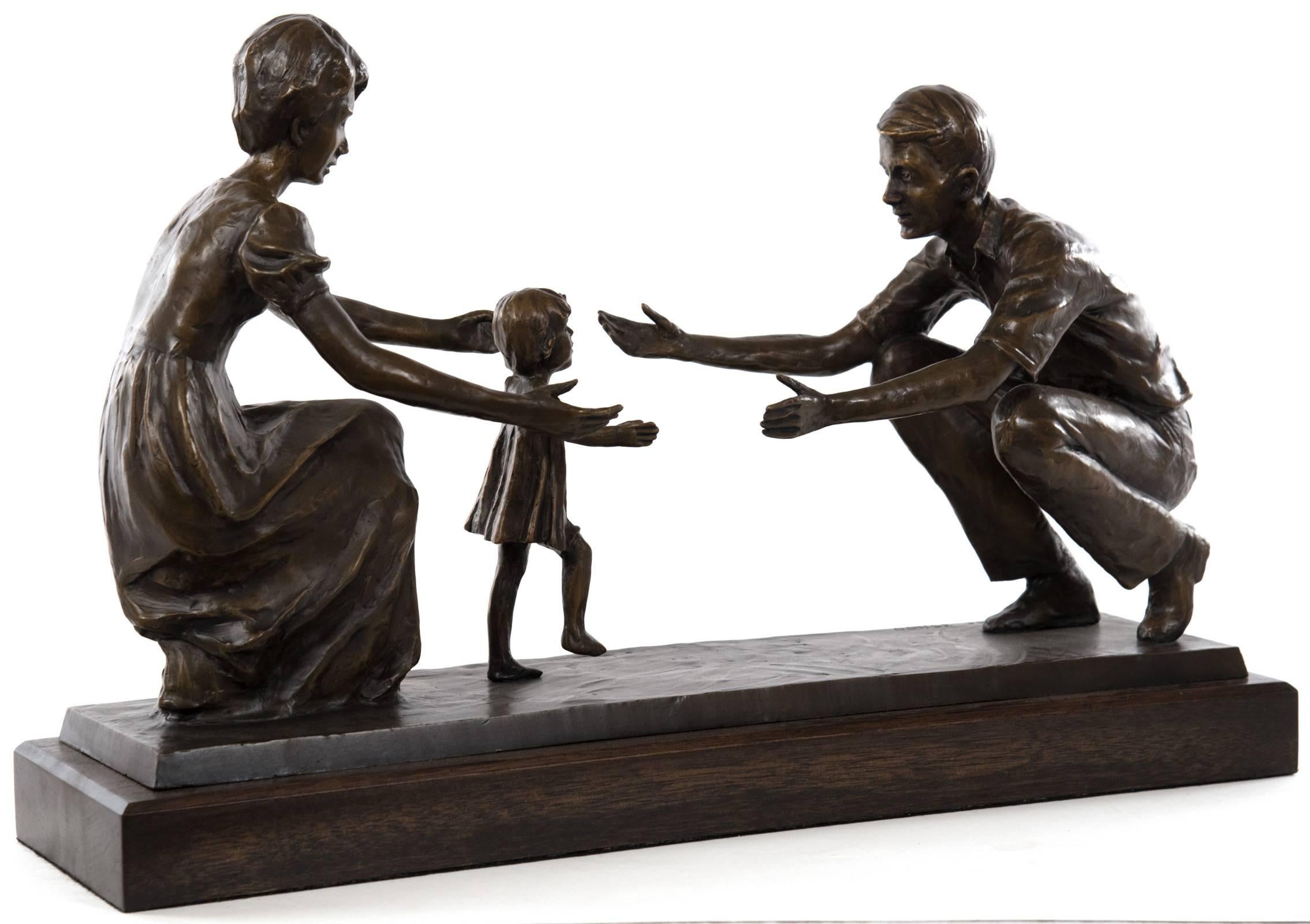 An intimate moment between a mother and a father as their young daughter takes her first steps, leaving the security of her mother's arms as she attempts to walk toward her father's open arms. The sculpture captures the anticipation and excitement