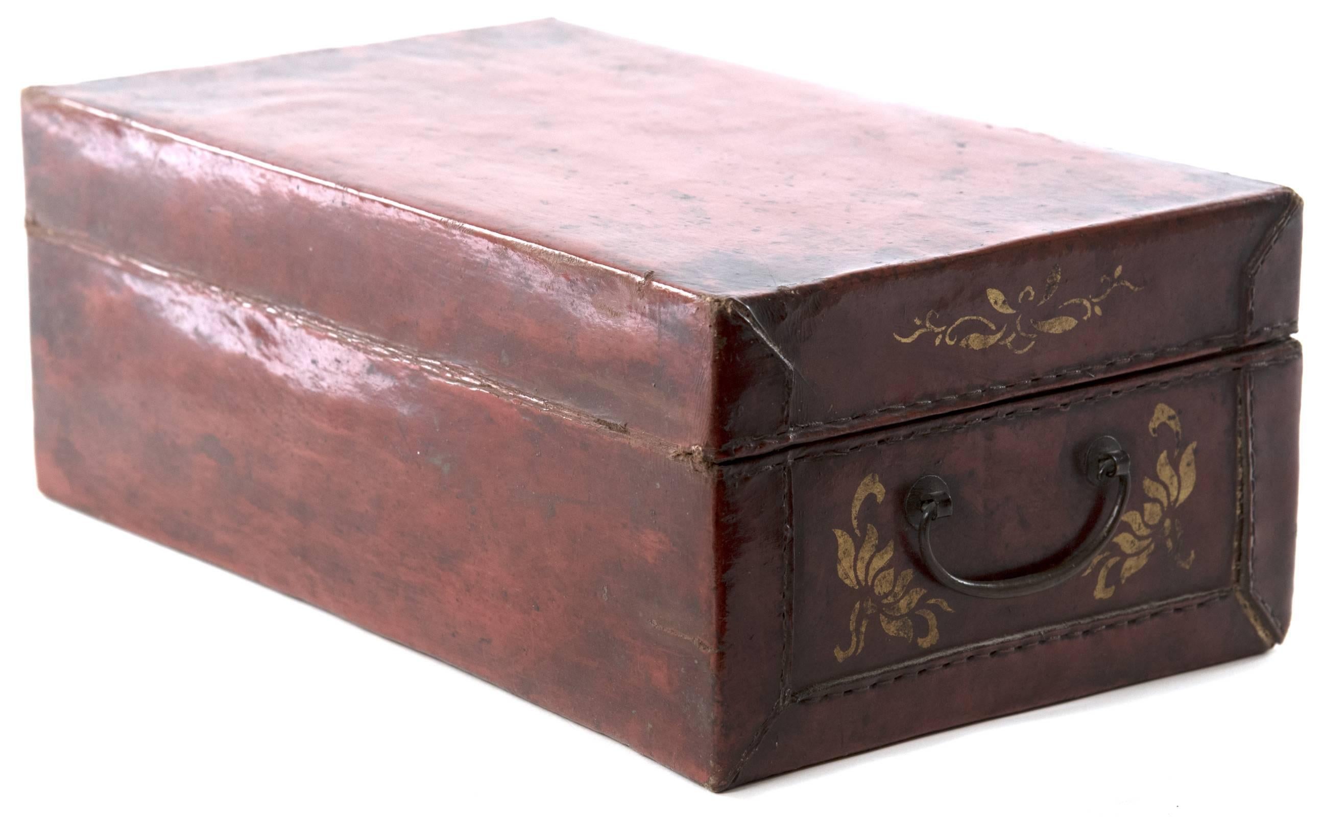 Chinese Red Leather Box with Gold-Stencil Foliate Ornamentation 1