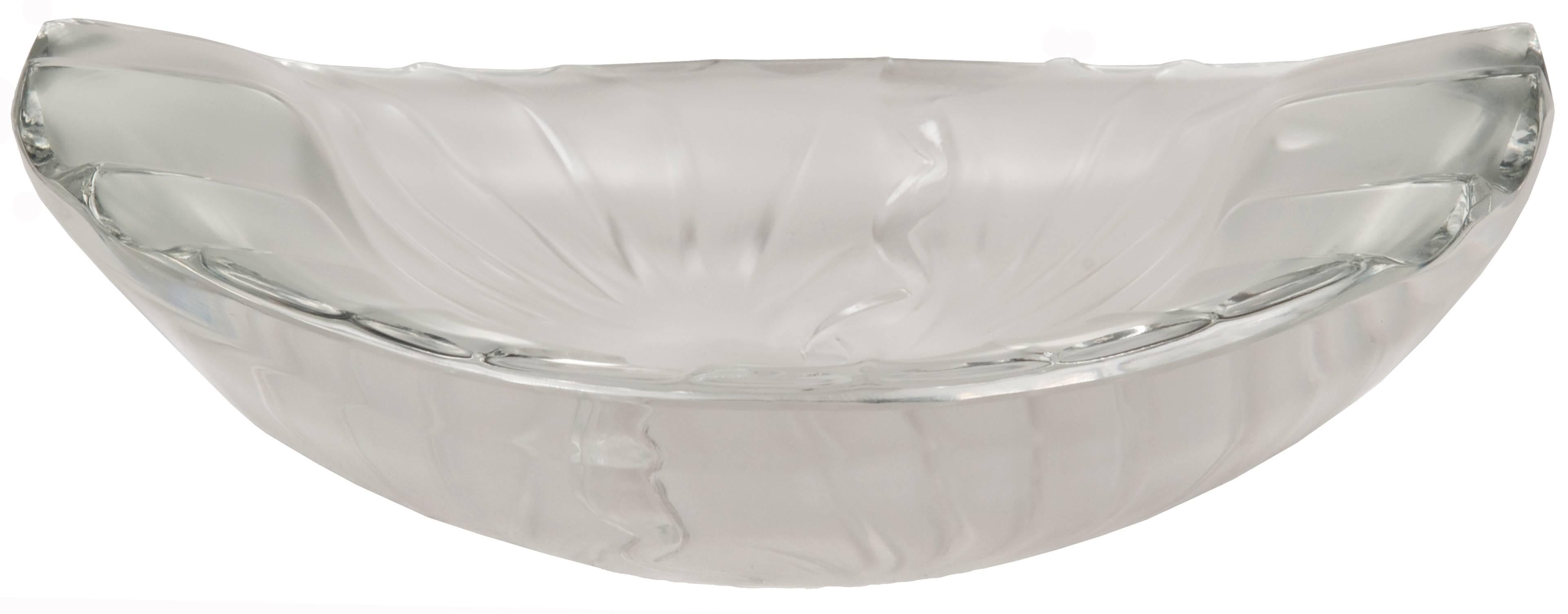 A beautifully thick-cut centrepiece bowl or sculptural work with slightly scalloped edges and linear etched design on interior of bowl made and signed by Lalique. The underside of the bowl is frosted and signed "Lalique France".