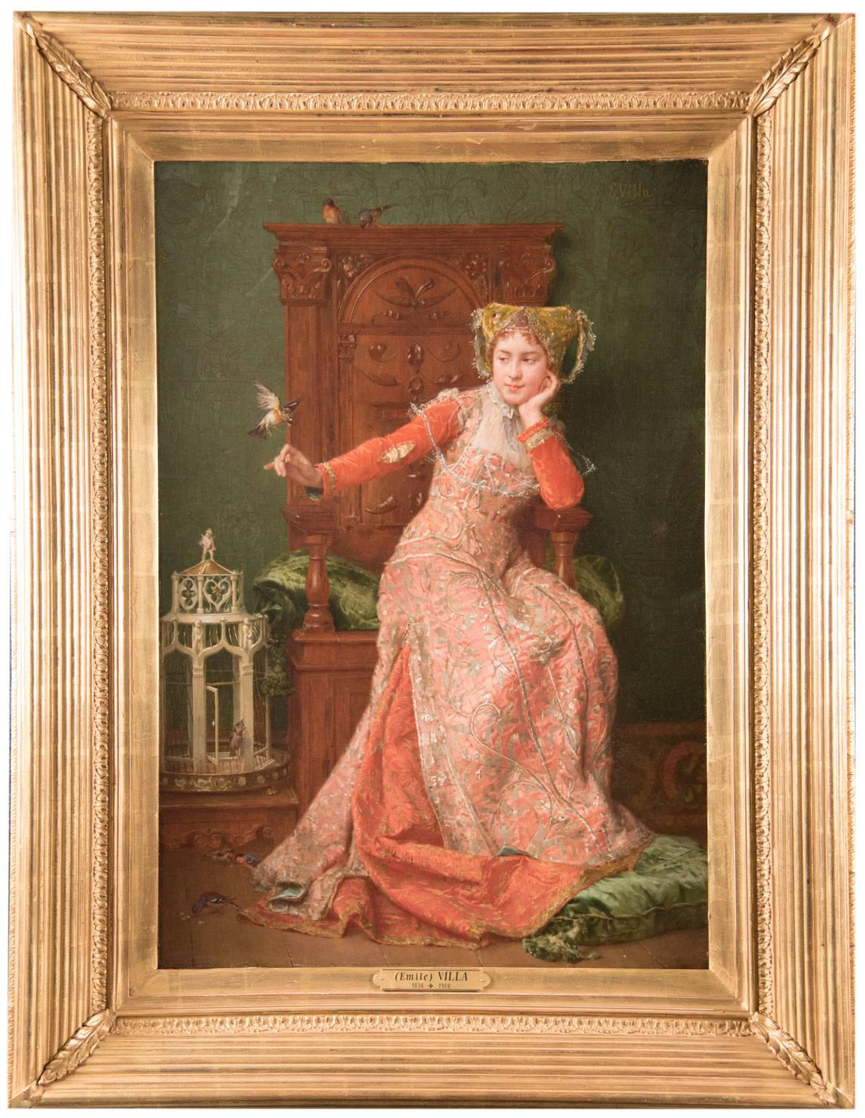 Louis Emile Villa's "As Free As a Bird" shows a quiet moment of a young woman, sitting languidly in a carved oak armchair and dressed in a pink dress with beautifully detailed gold embroidery, her outstretched arm coaxing a flitting bird