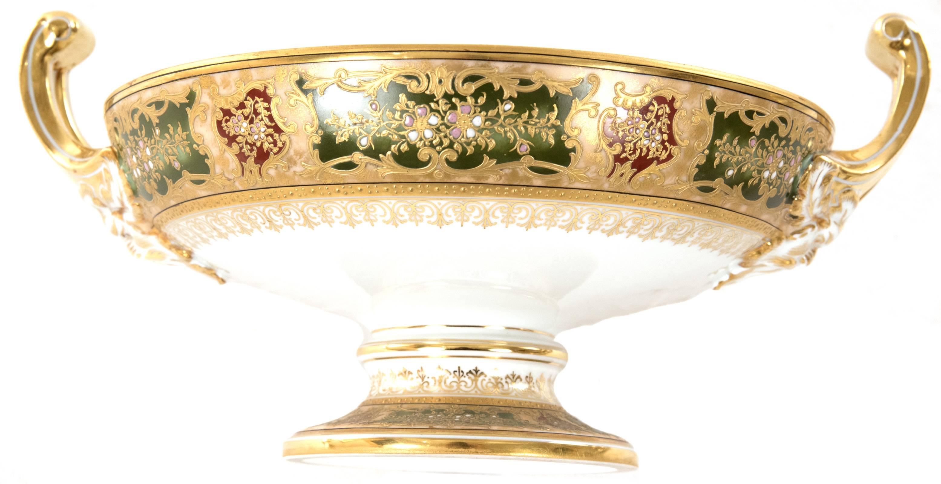 Beautifully painted and luxuriously gilt, this set includes ten serving dishes, two large lidded tureens with chargers, a serving bowl and a pouring dish. The set was made in Vienna during the last quarter of the 19th century by the prestigious