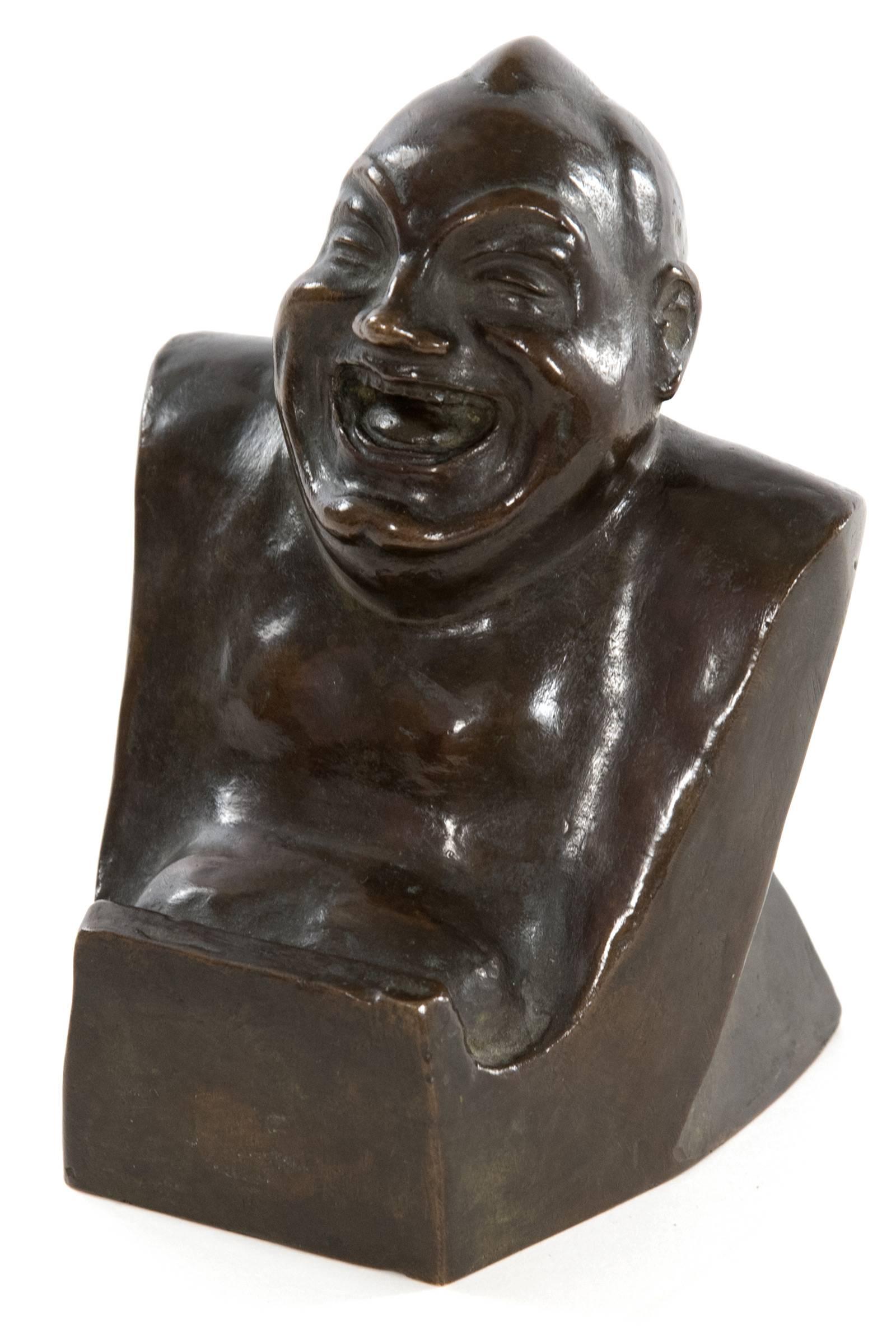 Enrico Caruso (1873–1921), the great Italian Opera Tenor, made himself as a self-caricature as a laughing Buddha and gifted the bronze statue to Arturo Toscanini in 1909. Signed 