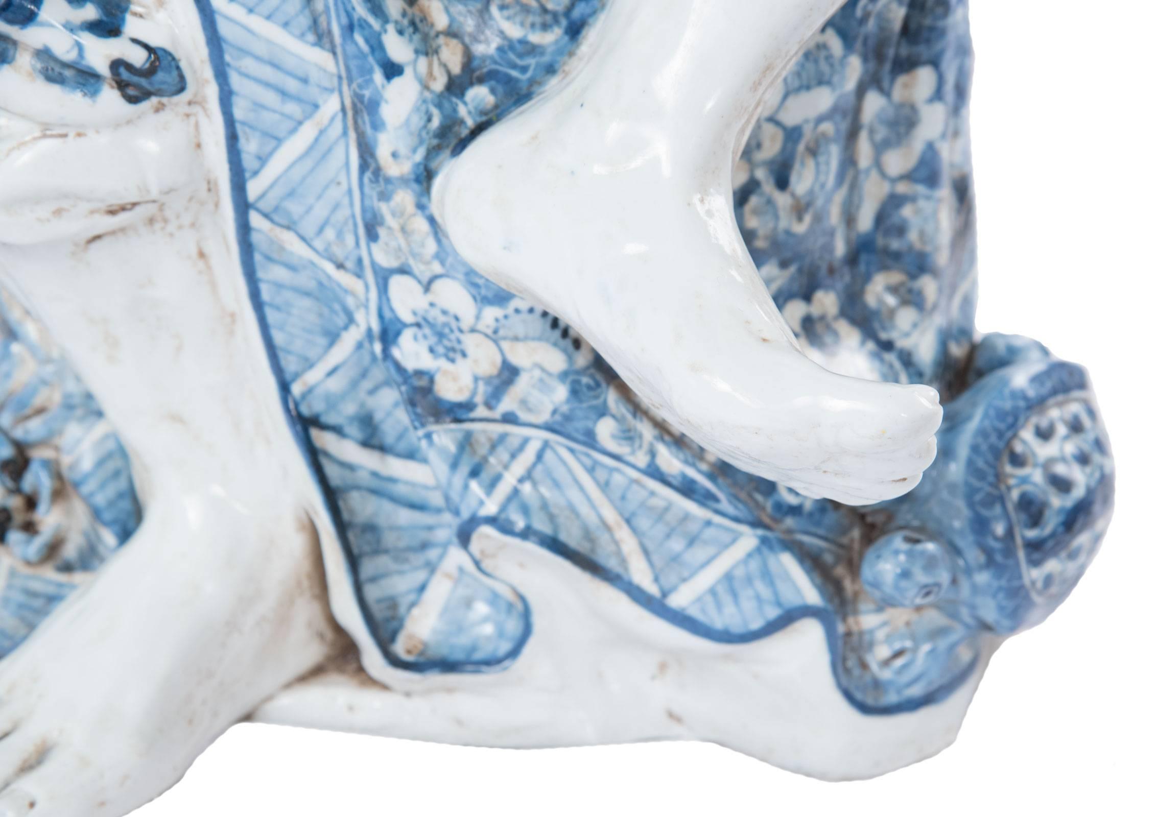 Blue and White Chinese Porcelain Man and Fish Sculpture 2