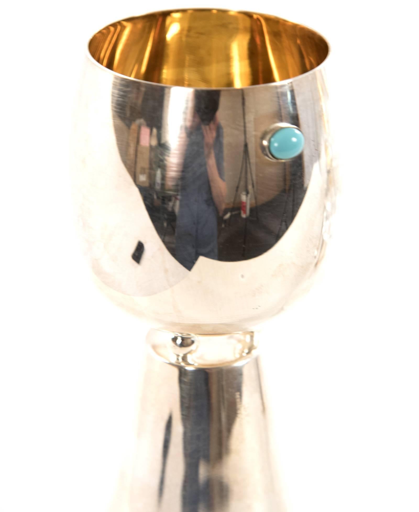 A set of six Serego Alighieri Masi wine goblets formed from pewter and glass, the two materials combined to create a nontraditional service set. The globular forms, decorated with a mix of inset colored stones and relief forms accented with gold