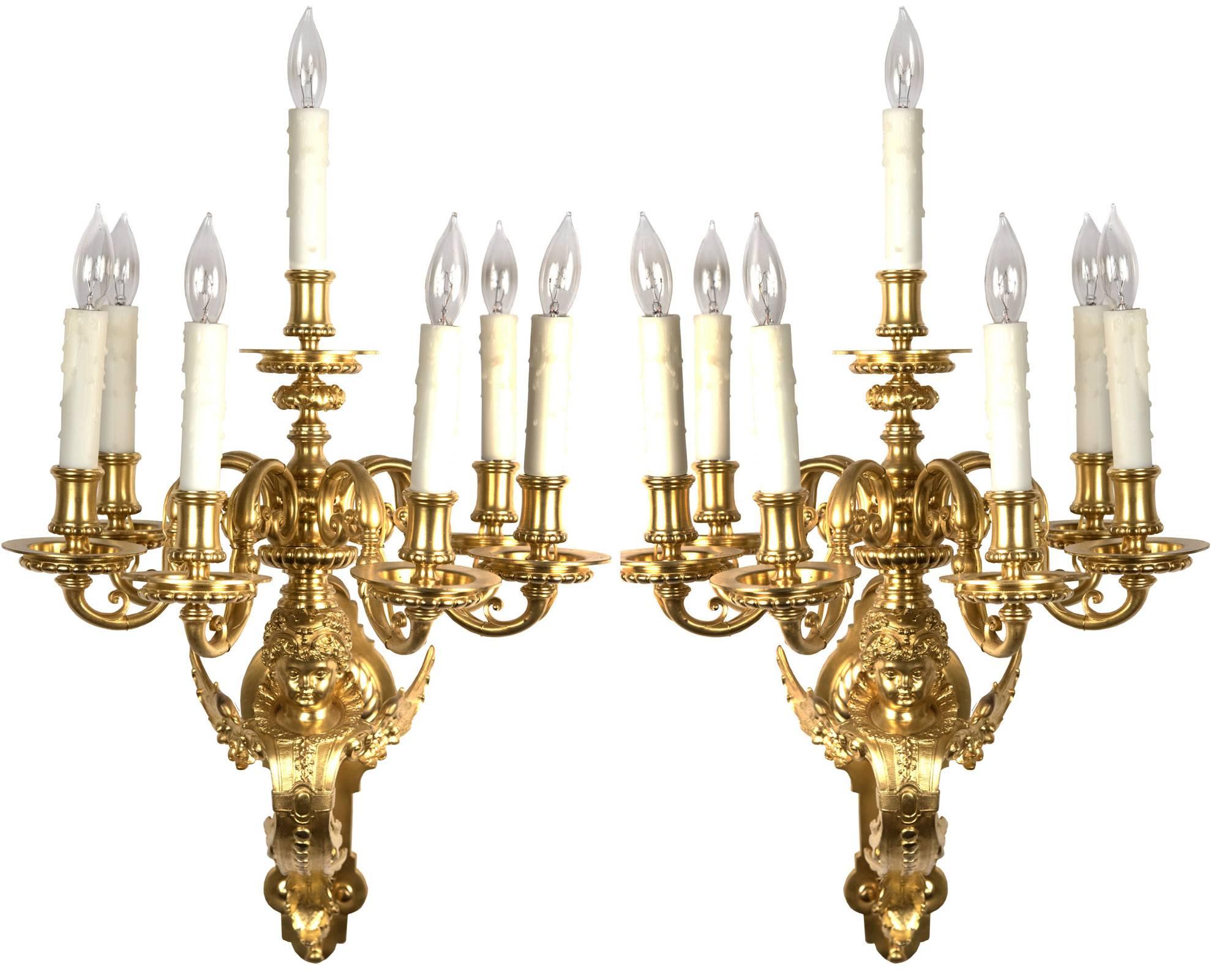 Each featuring an angel dressed in Renaissance garb and seven candle holders, these sconces bear the craftsmanship of an academically-trained sculptor.