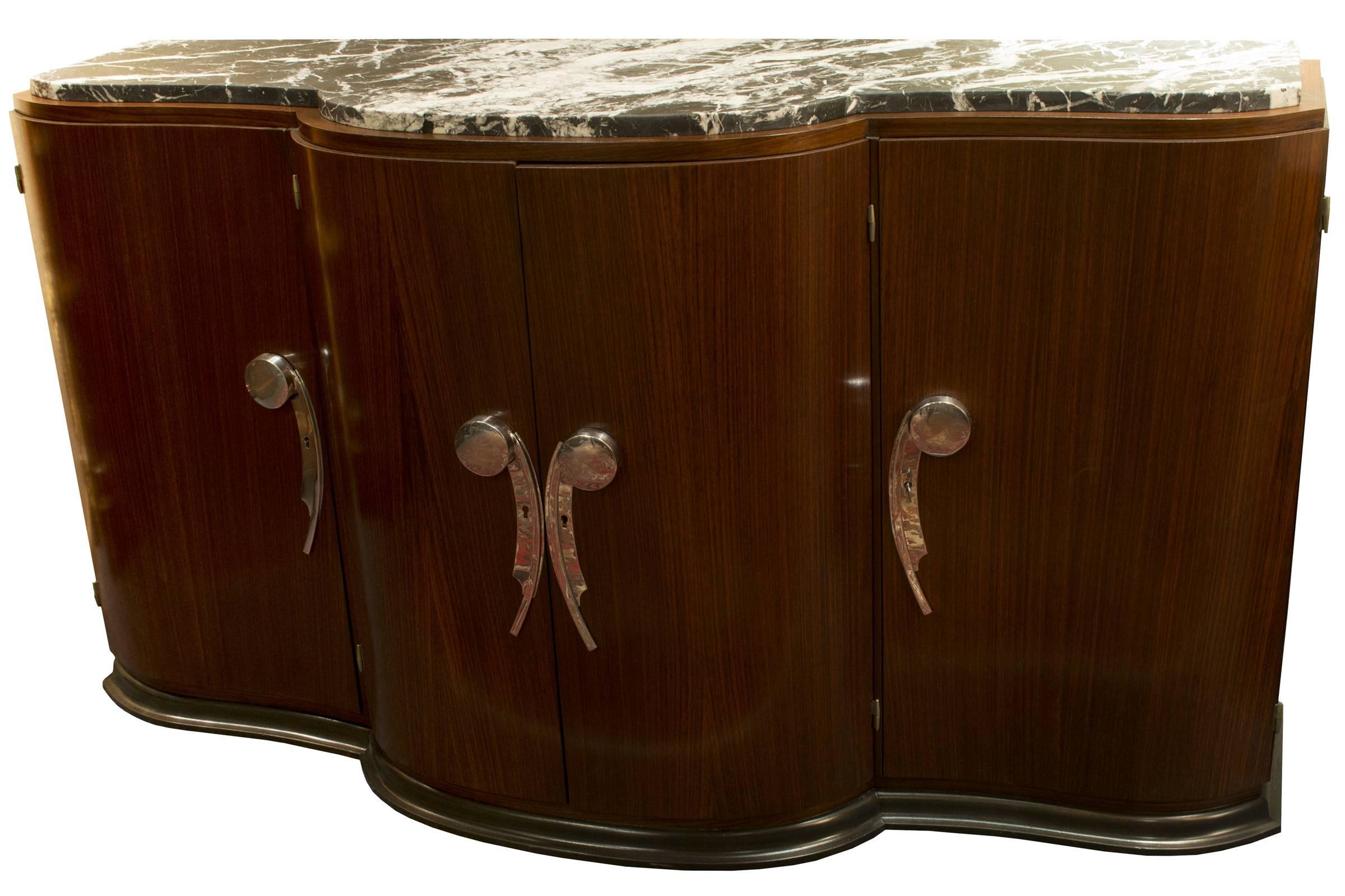 A solid black-and-white marble topped, mid-century French break-front buffet with chromed metal hardware.