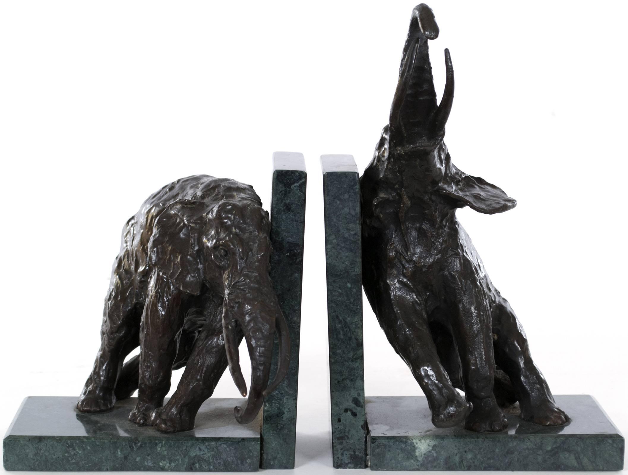 A pair of Elephant bookends on green marble stands by the critically acclaimed sculptor  Ary Bitter (French, 1883 - 1973), who studied with Louis-Ernest Barrias at the École national supérieure des Beaux-Arts in Paris, before become a celebrated