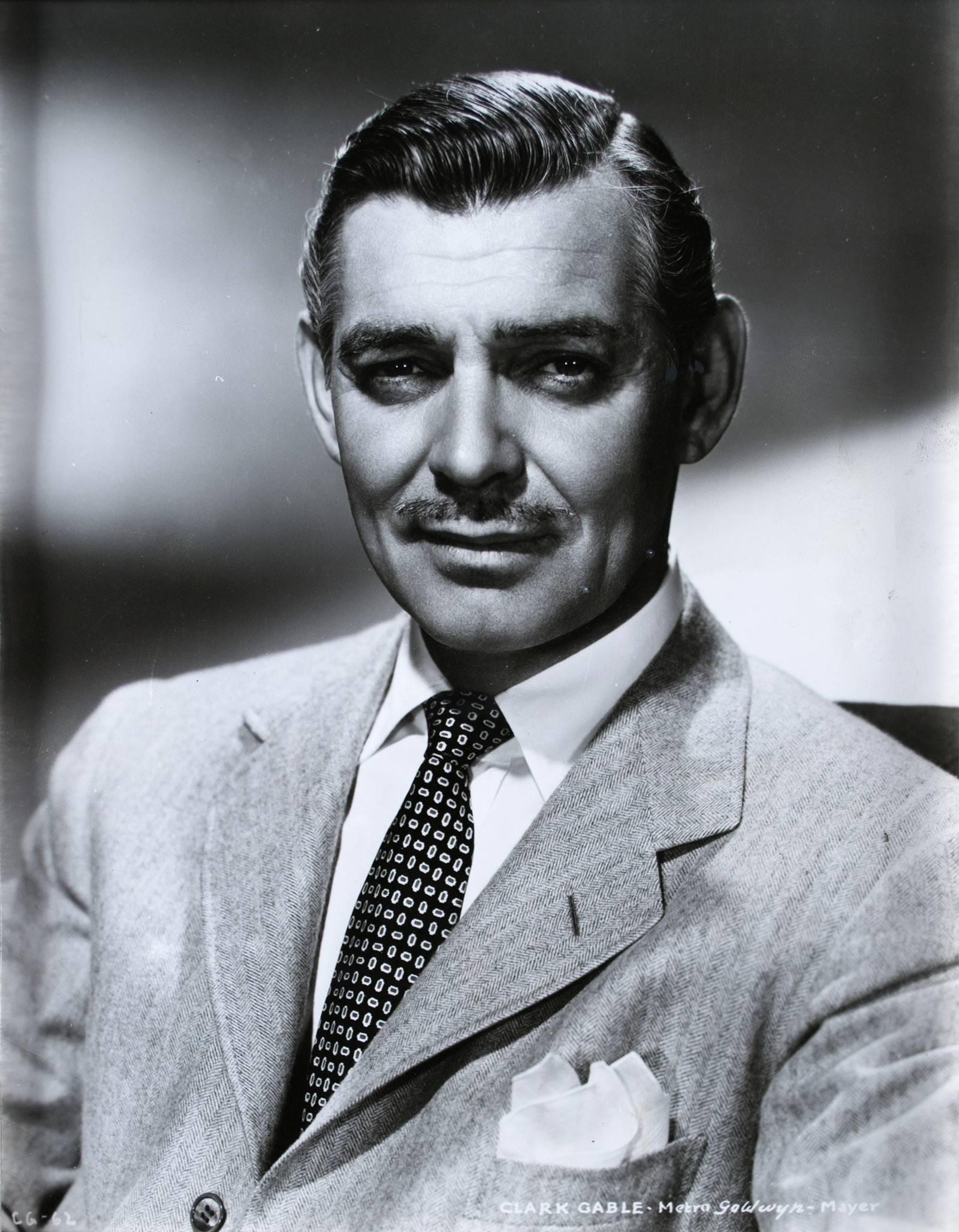 A framed portrait of the Hollywood leading man Clark Gable (1901 - 1960), accompanied by a check signed and dated 1944. From the Sunset branch of the Bank of America in Hollywood, California. A fine piece of memorabilia.