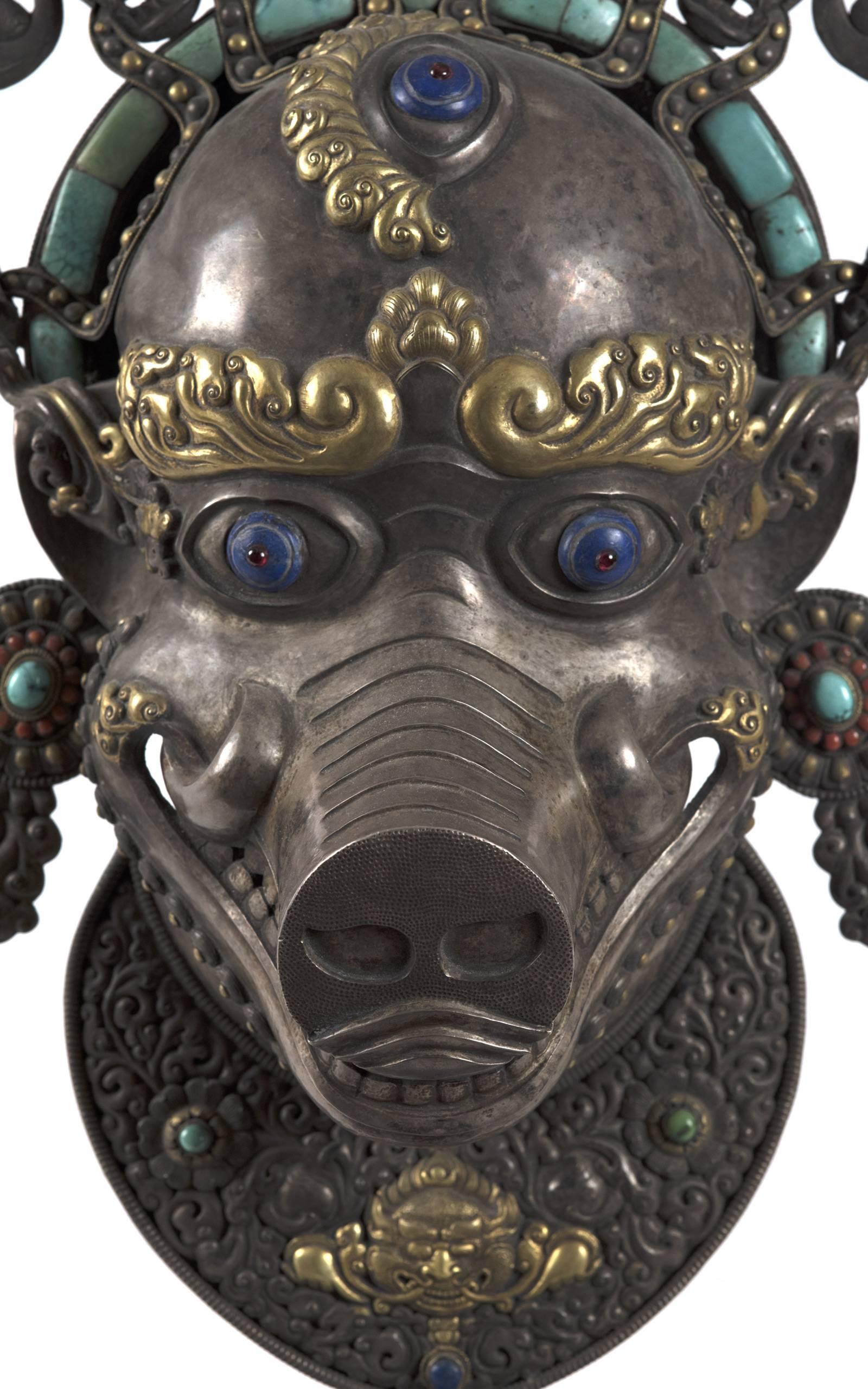 The temples of Kathmandu are guarded by four sow deities, who stand at each of the cardinal points. Dhumbarahi, the grey goddess, protects the north against all enemies, in particular disease. This authentic, nineteenth-century Nepalese statue of