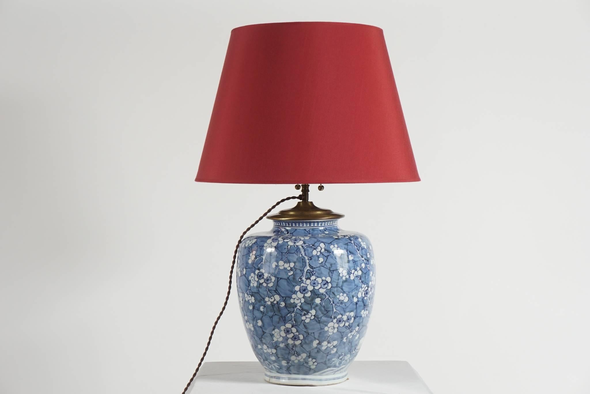 A large, early Chinese Qing Dynasty blue and white porcelain vase of globular form having 