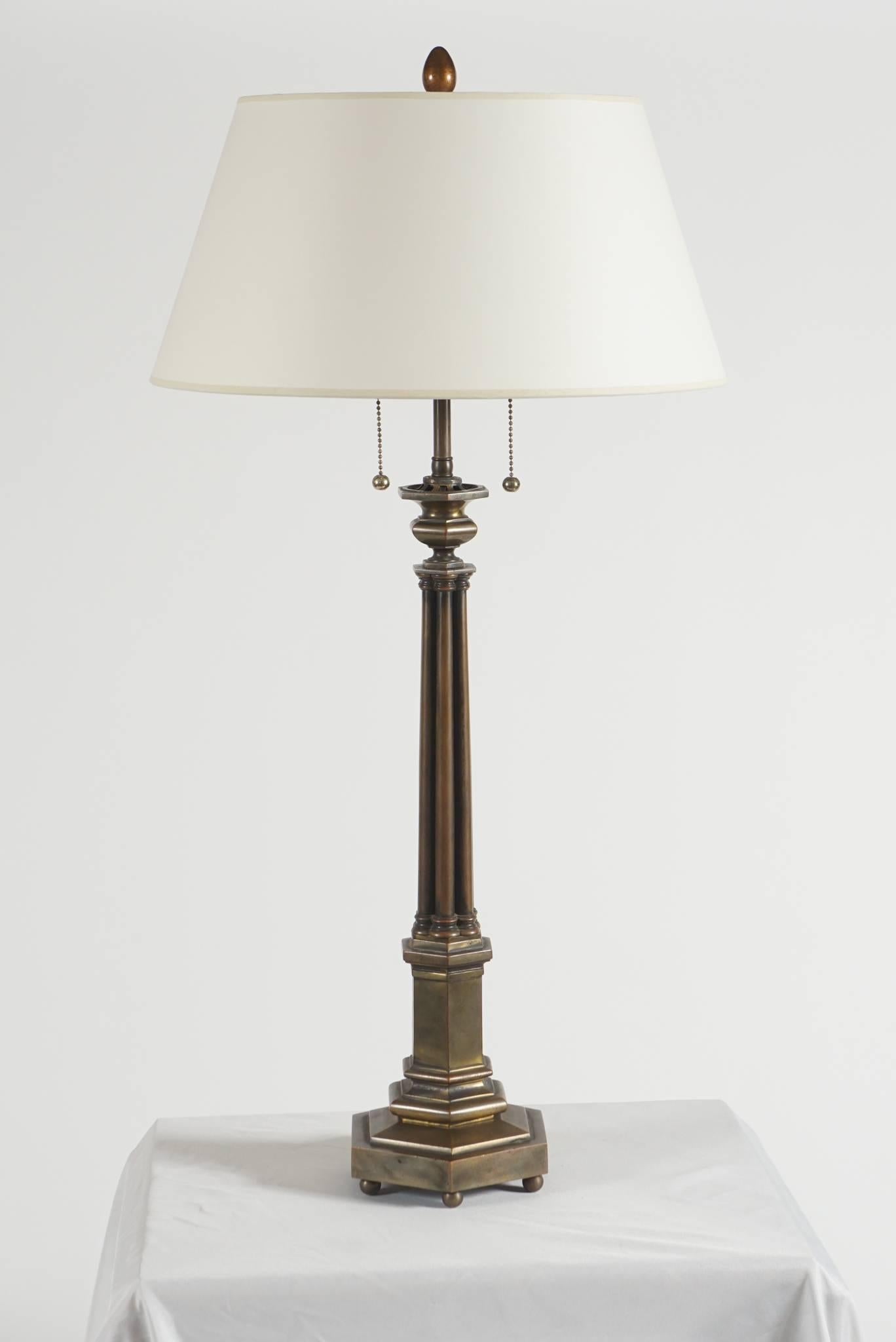 An elegant, circa 1840 solid bronze table lamp of hexagonal form with urn surmounting clustered column on stepped plinth base on ball feet by the Boston, Massachusetts firm of Henry N. Hooper & Company, a leading purveyor of lighting fixtures in