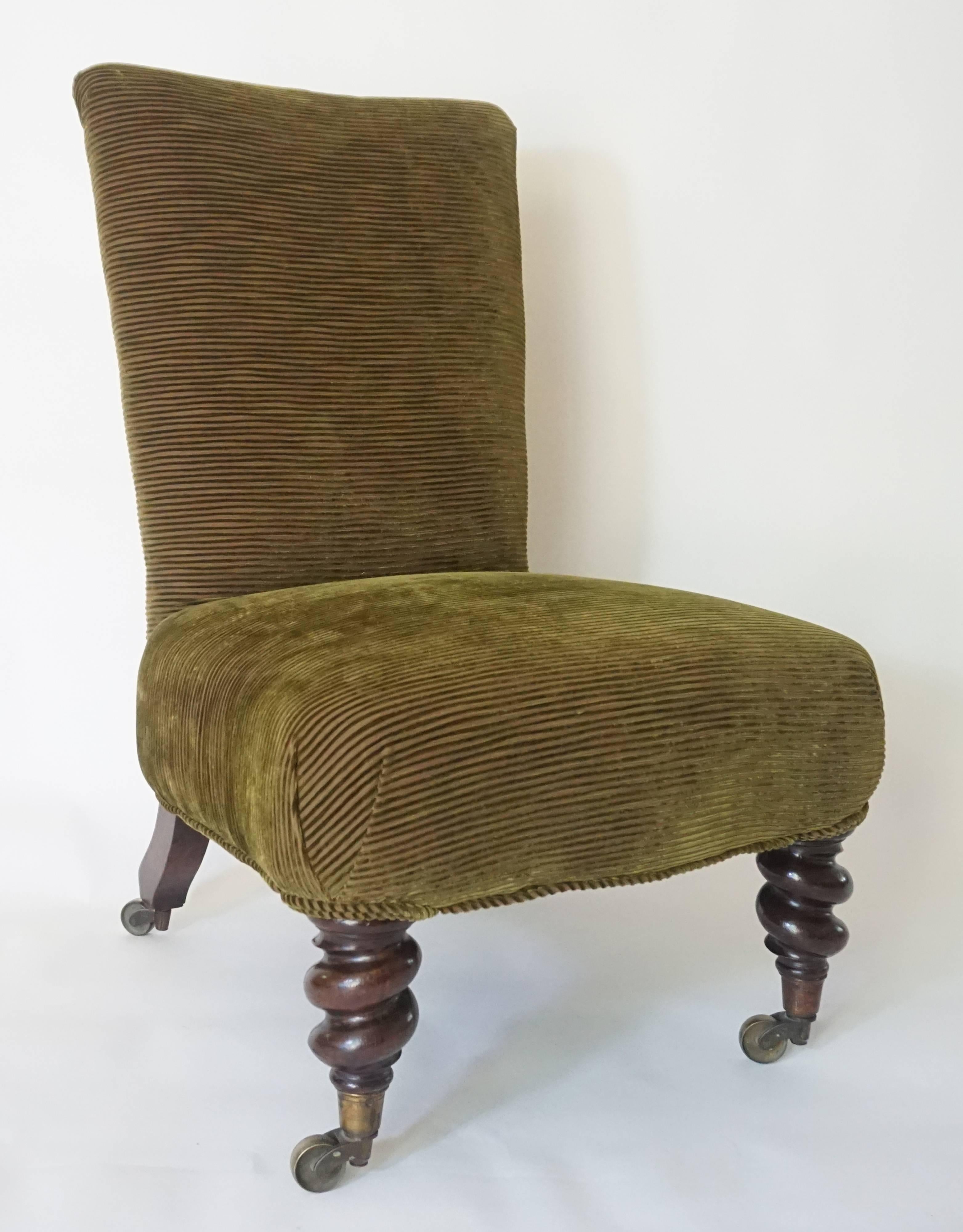 Late English Regency / Early Victorian period, circa 1840, upholstered slipper chair having high back tapering into shaped seat on front tapering spiral twist-turned rosewood legs and splayed rear all with original casters marked 'Cope and Collinson