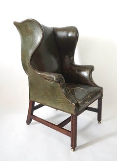 Fauteuil à oreilles en cuir de style George III, vers 1780