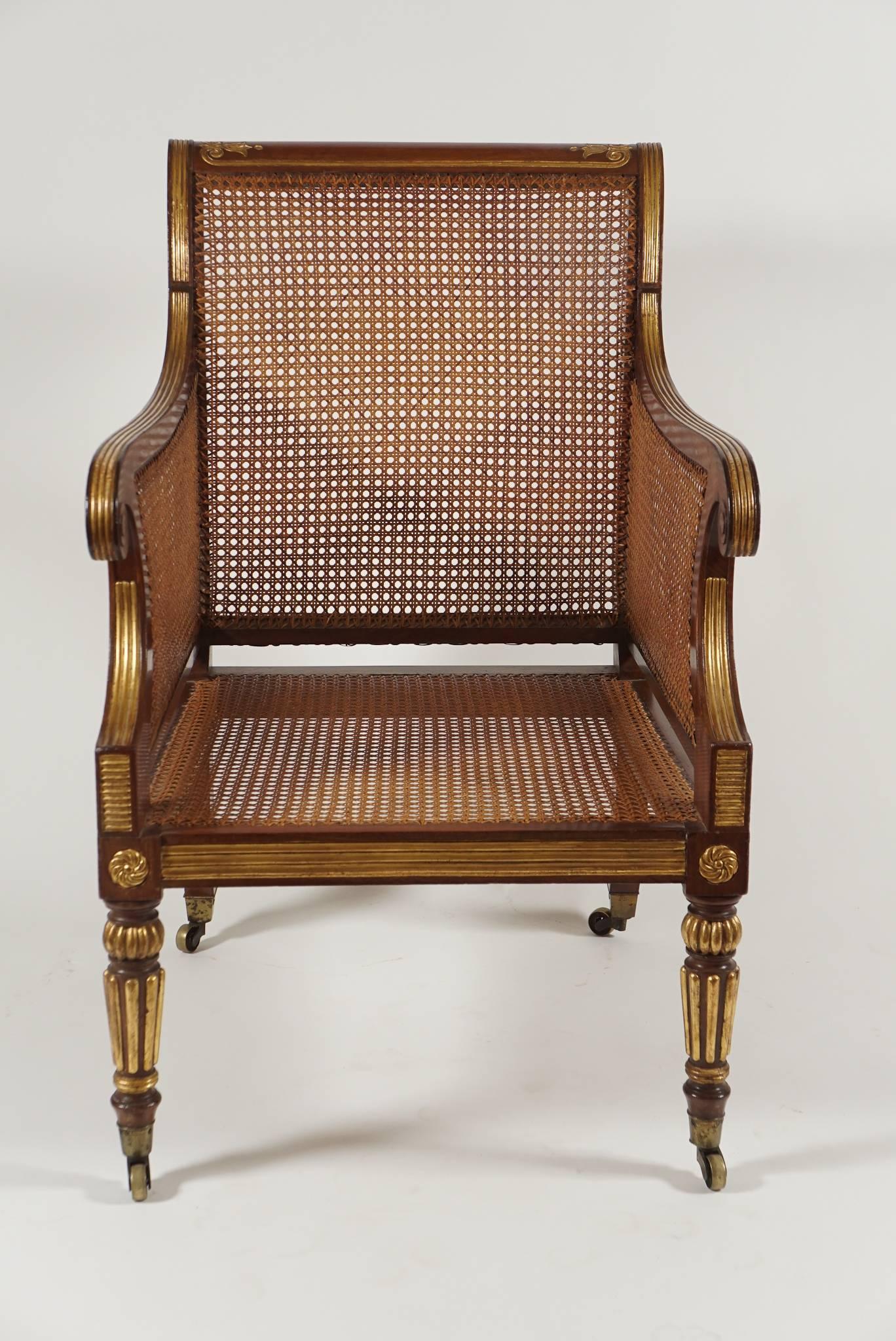 British Regency Parcel-Gilt Caned Armchair, England, circa 1810