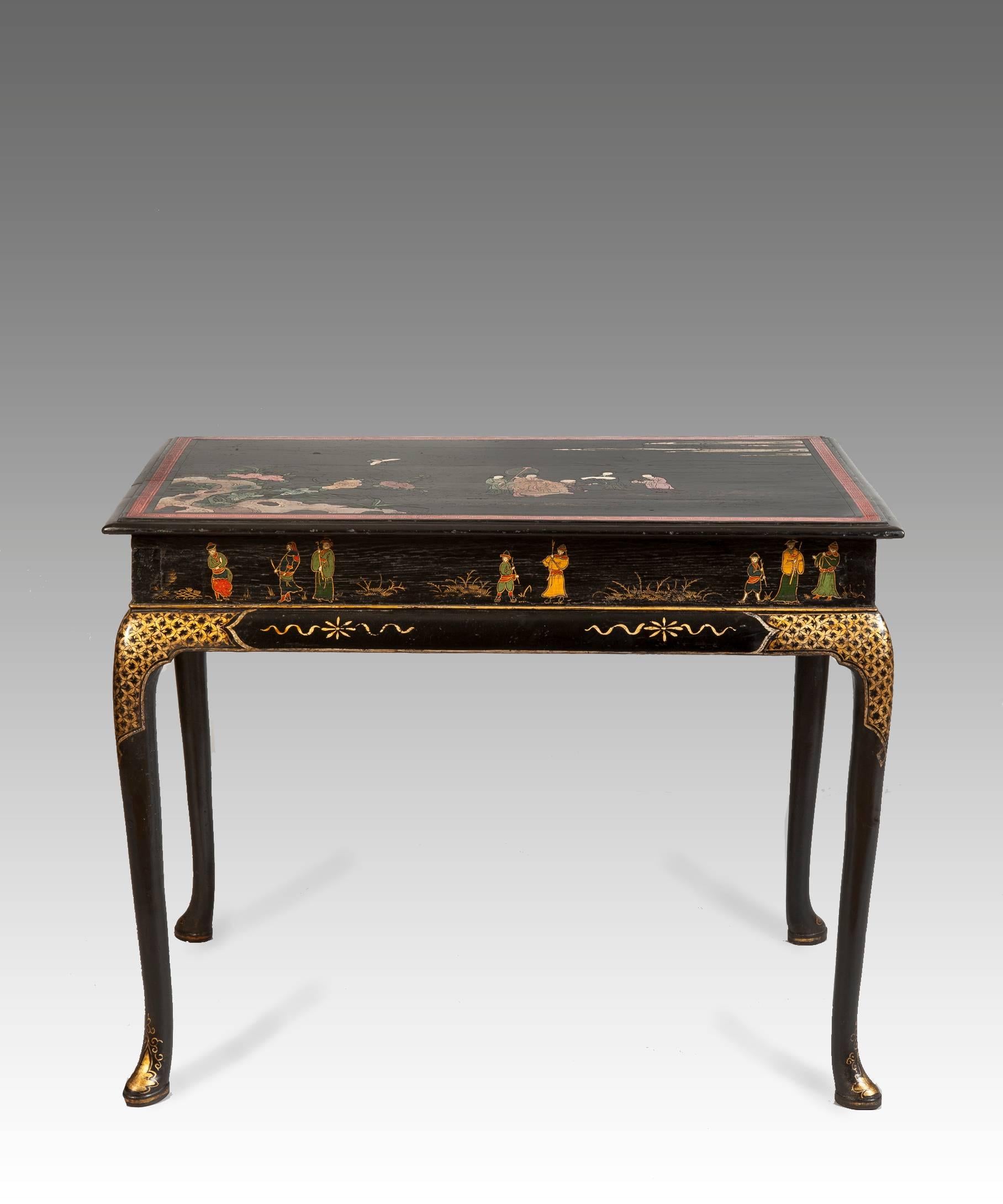 A rare Queen Anne period black lacquer and Japanned centre table; the centre table's top decorated in coromandel lacquer depicting a group of Chinese figures set in a landscape above a frieze decorated with fragments of 17th century Japanese