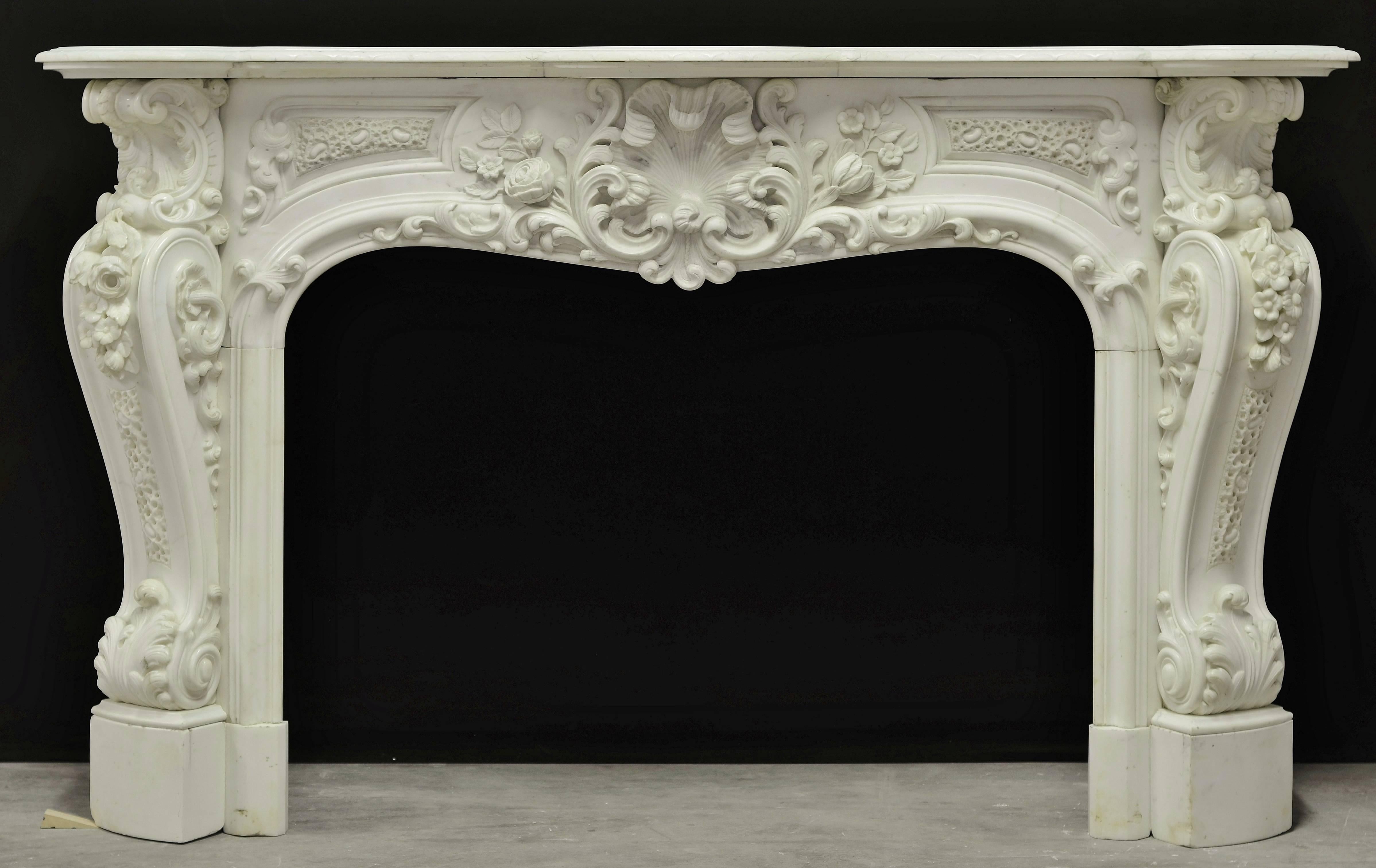 A beautiful, monumental 19th century Louis XV fireplace carved in statuary marble.
The very delicate an rich floral carving are exquisitely executed in Italian statuary marble.
Sold by Willem Schermerhorn Antique Fireplaces

Ready to be shipped and
