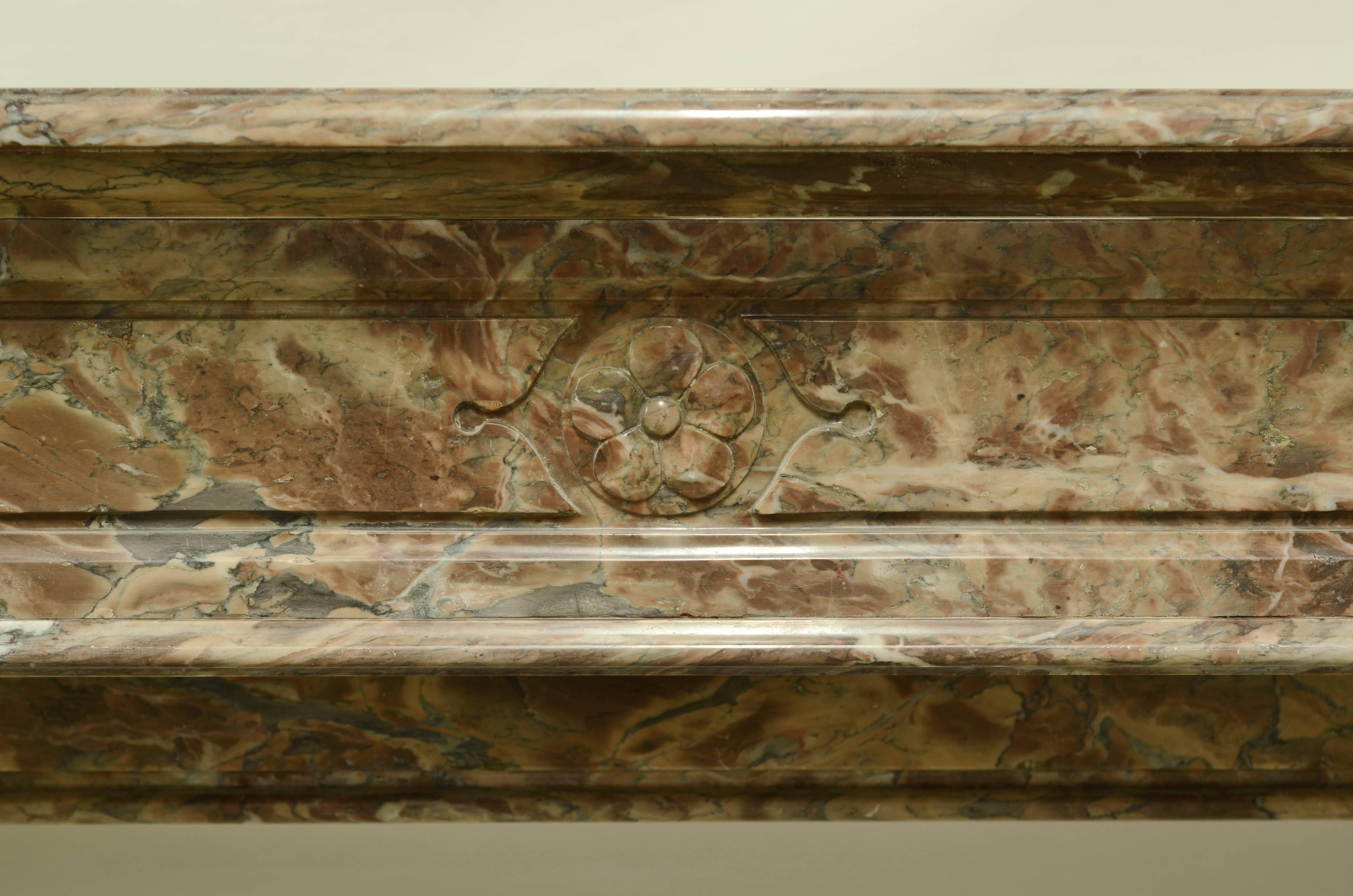 19th century French marble Louis XVI fireplace mantel with pillars.

Opening measurements: 34.8 x 38.9 inch or 88.5 x 99 cm. (height x width).

Excellent condition, ready to be shipped and installed.