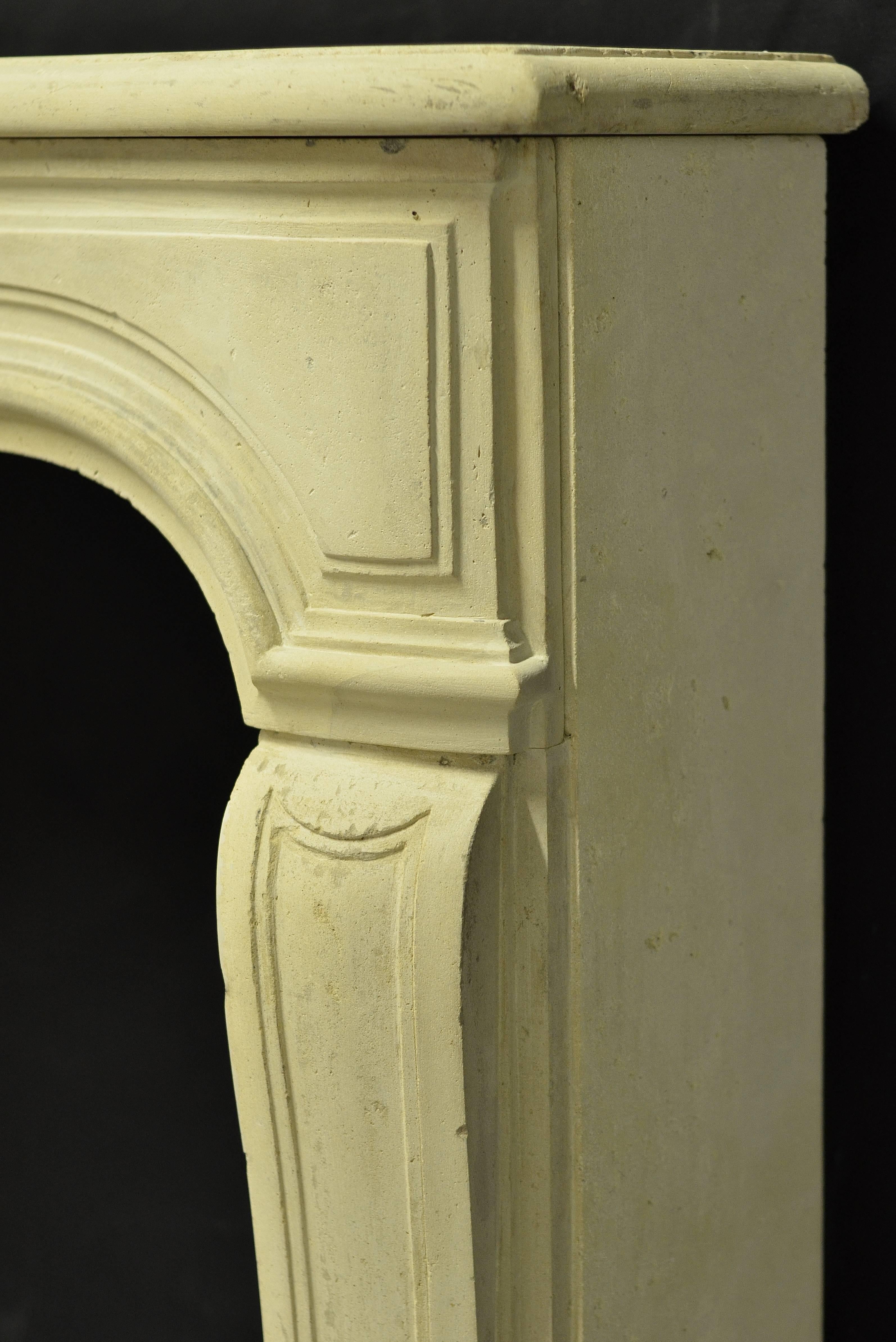 Carved Antique French Limestone Louis XV Fireplace Mantel