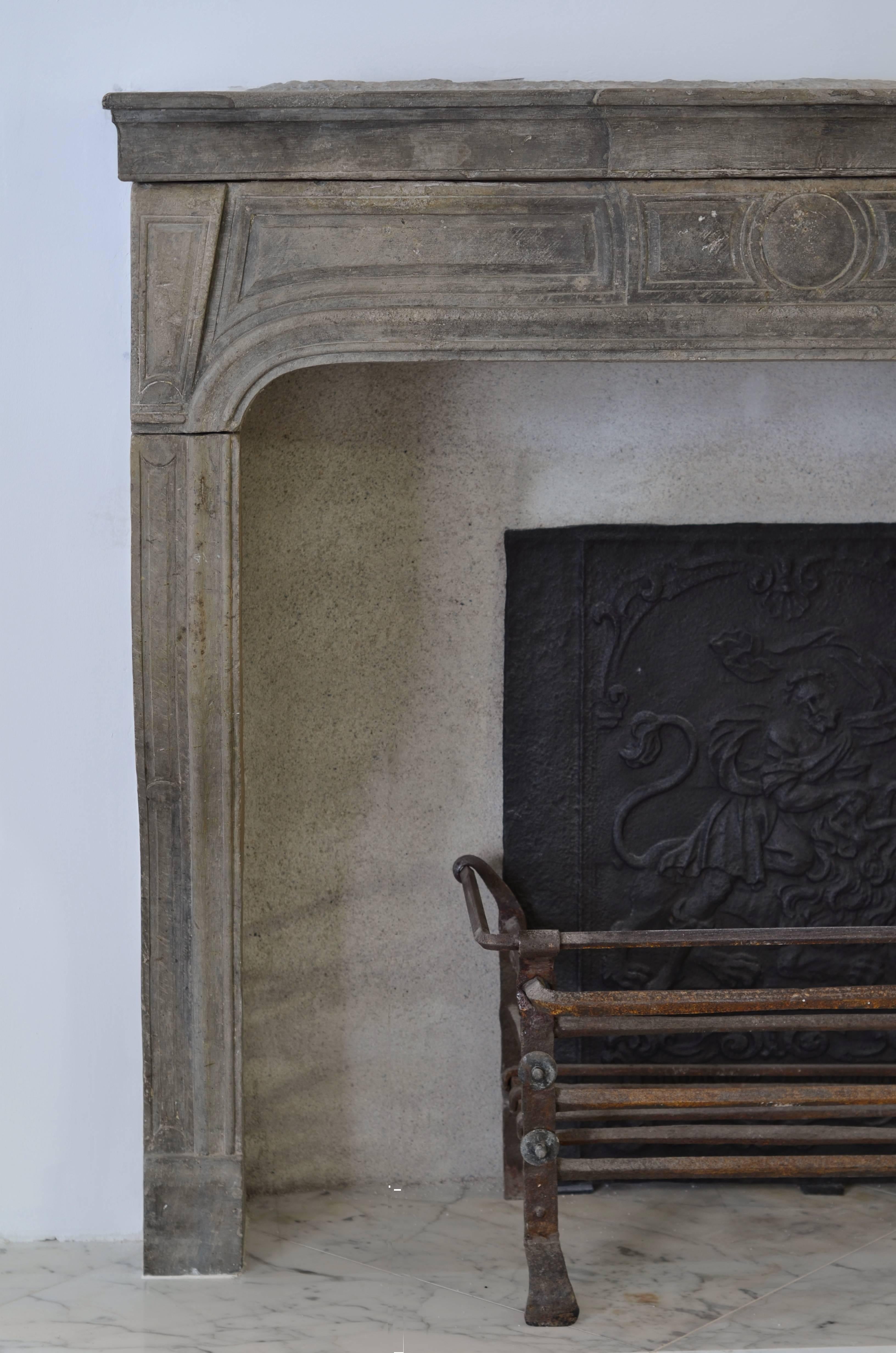 17th Century Fireplace in Its Purist Form, Antique French Louis XIV in Grey Limestone