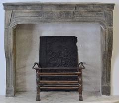 Fireplace in Its Purist Form, Antique French Louis XIV in Grey Limestone