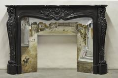 Belle et rare cheminée Louis XV en marbre noir avec insert d'origine