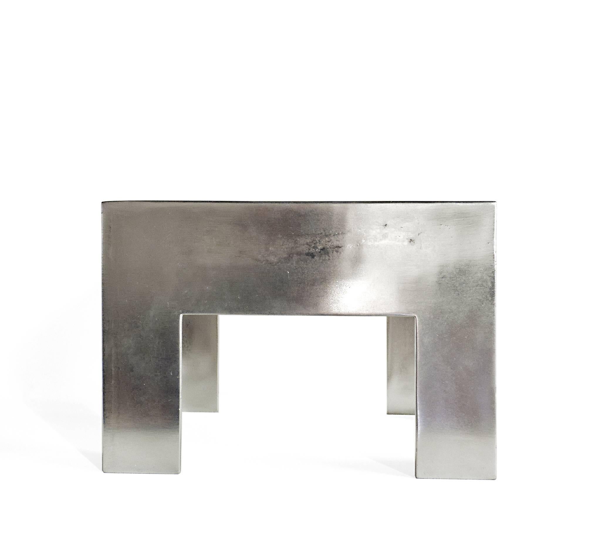 Limited Edition centerpiece in cast pewter, hand finished with welding and brush polishing.

Numbered and signed.
