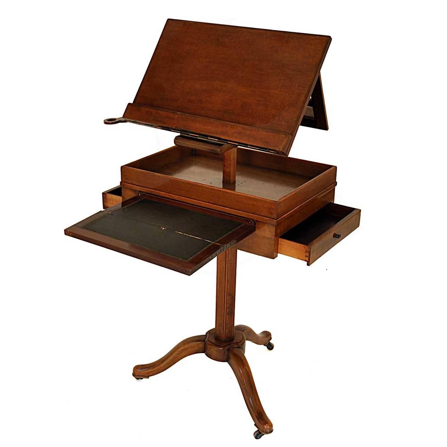 This piece was designed by Flatow&Priemer in 1823 in Berlin. The table is made of mahogany. It is possible to adjust the high. There are three drawers and one extensible panel. The item has wheels. The signature is placed on the bottom.