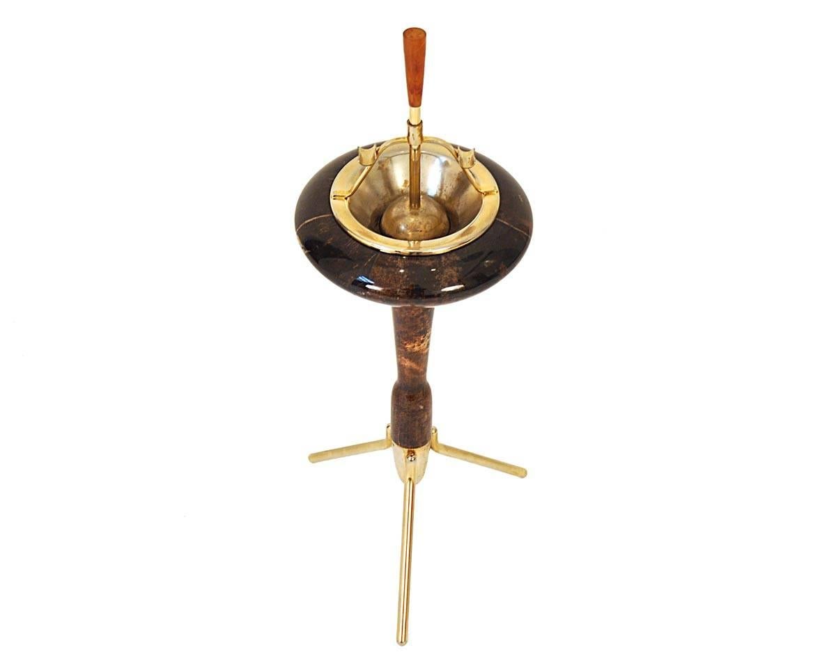 This ashray was designed by Aldo Tura and manufactured in Italy in 1950s. It is made of brass and goat skin, lacquered.
