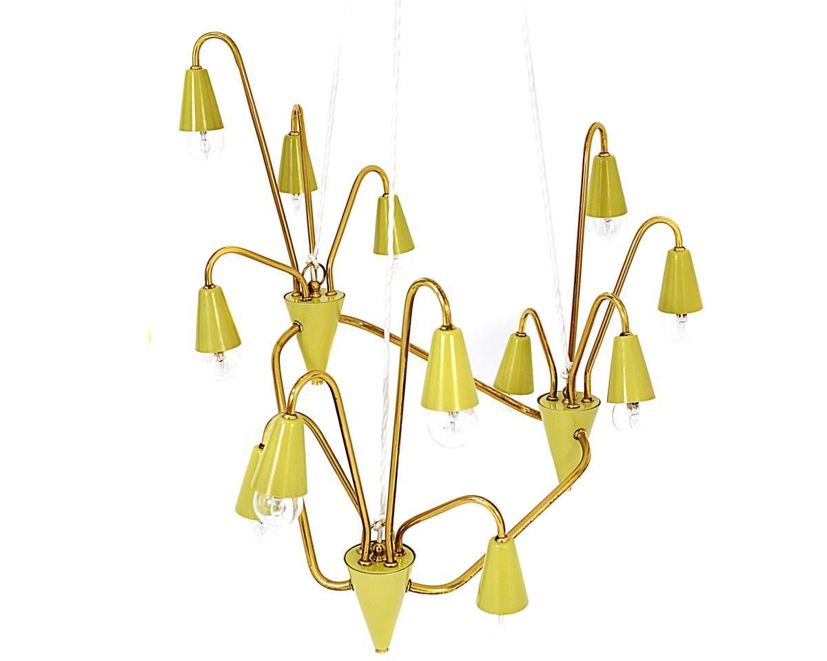 This chandelier was manufactured in Austria in 1950s. It is made of brass. The lampshades are made of metal which is covered with green varnish. There are also two suitable appliqués. The item is in original condition.