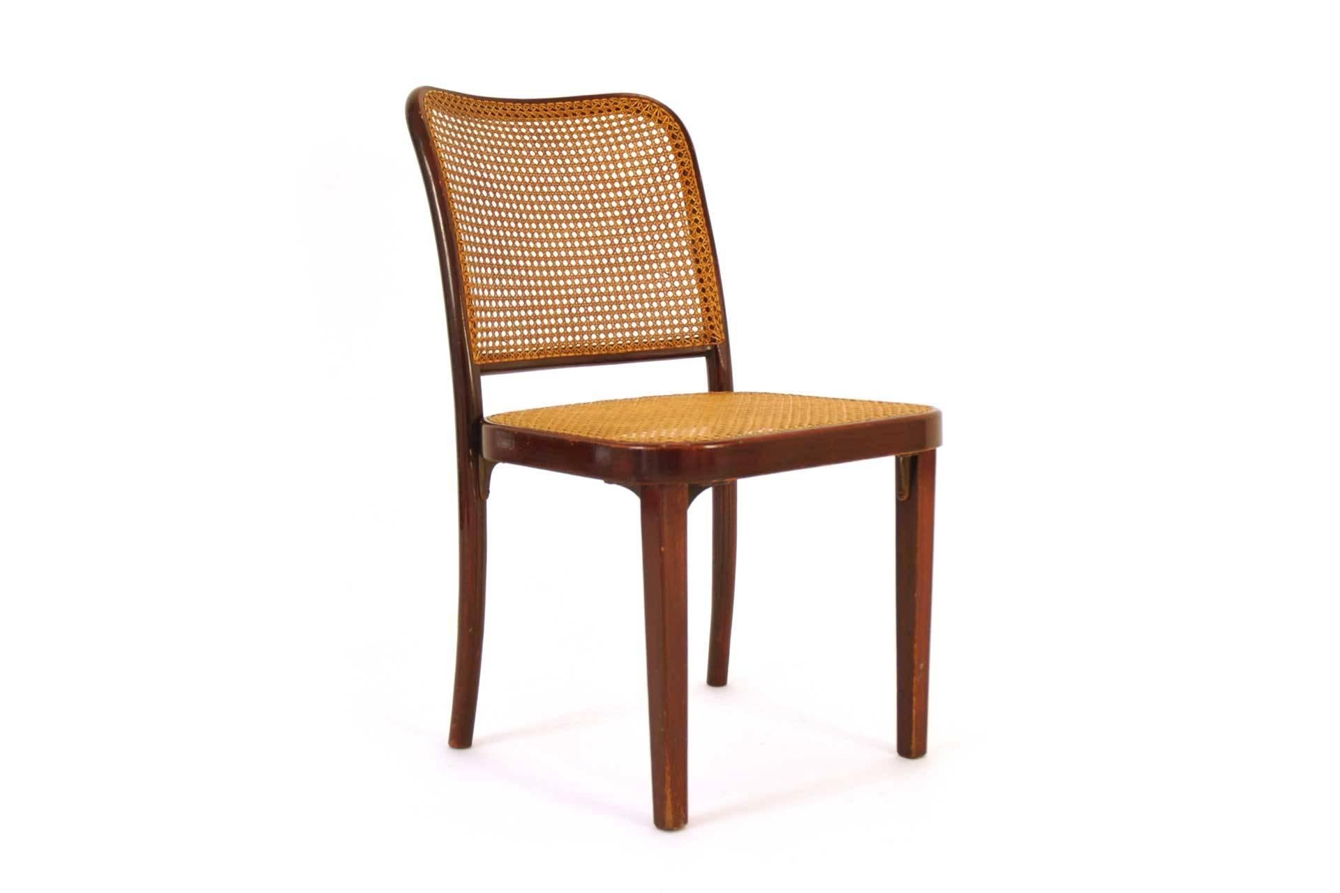This piece was designed by Gustav Adolf Schneck or Josef Hoffmann in 1920s in Austria. The chairs are made of curved beech which is stained and polished. The seat and backrest are covered with network, which is probably renewed. Between seat and