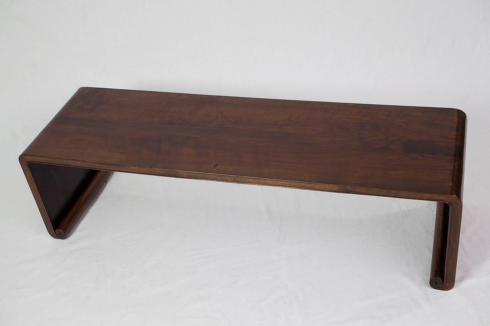 This stunning 19th century kang table made from walnut wood combines elegance and simplicity with exclusive material. Characteristic of Shanxi furniture, pieces of this quality are a rare find nowadays. 

This piece is made entirely from walnut