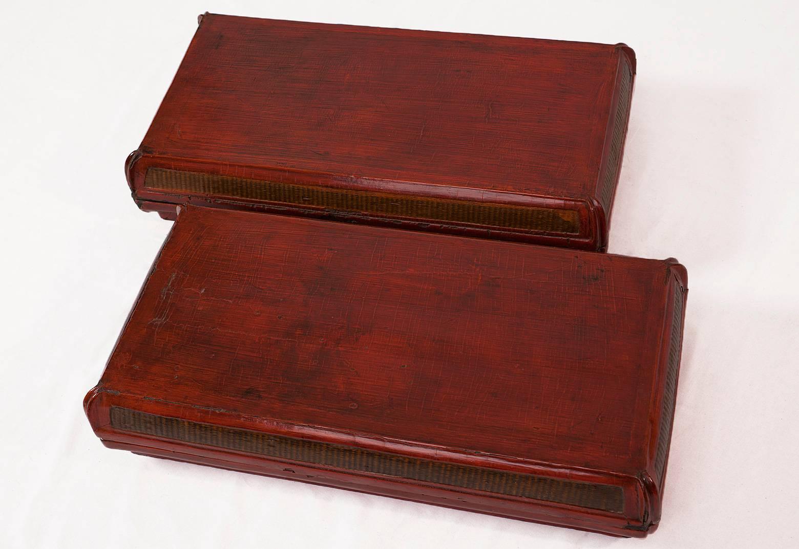 
A decorative pair of 19th century Chinese red lacquer food boxes with cane weaving from Shanxi province. 

This type of box was usually used as gift for important people presented during one of the official outdoors events so popular in Shanxi. The
