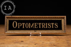 Antique Reverse-Painted "Tallimit" Brass-Tone "Optometrists" Sign