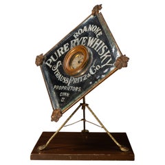 Orologio da tavolo con specchio pubblicitario d'epoca del whisky Roanoke Pure Rye