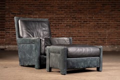 Ensemble contemporain de fauteuil et pouf en cuir italien de Roche Bobois, couleur noire