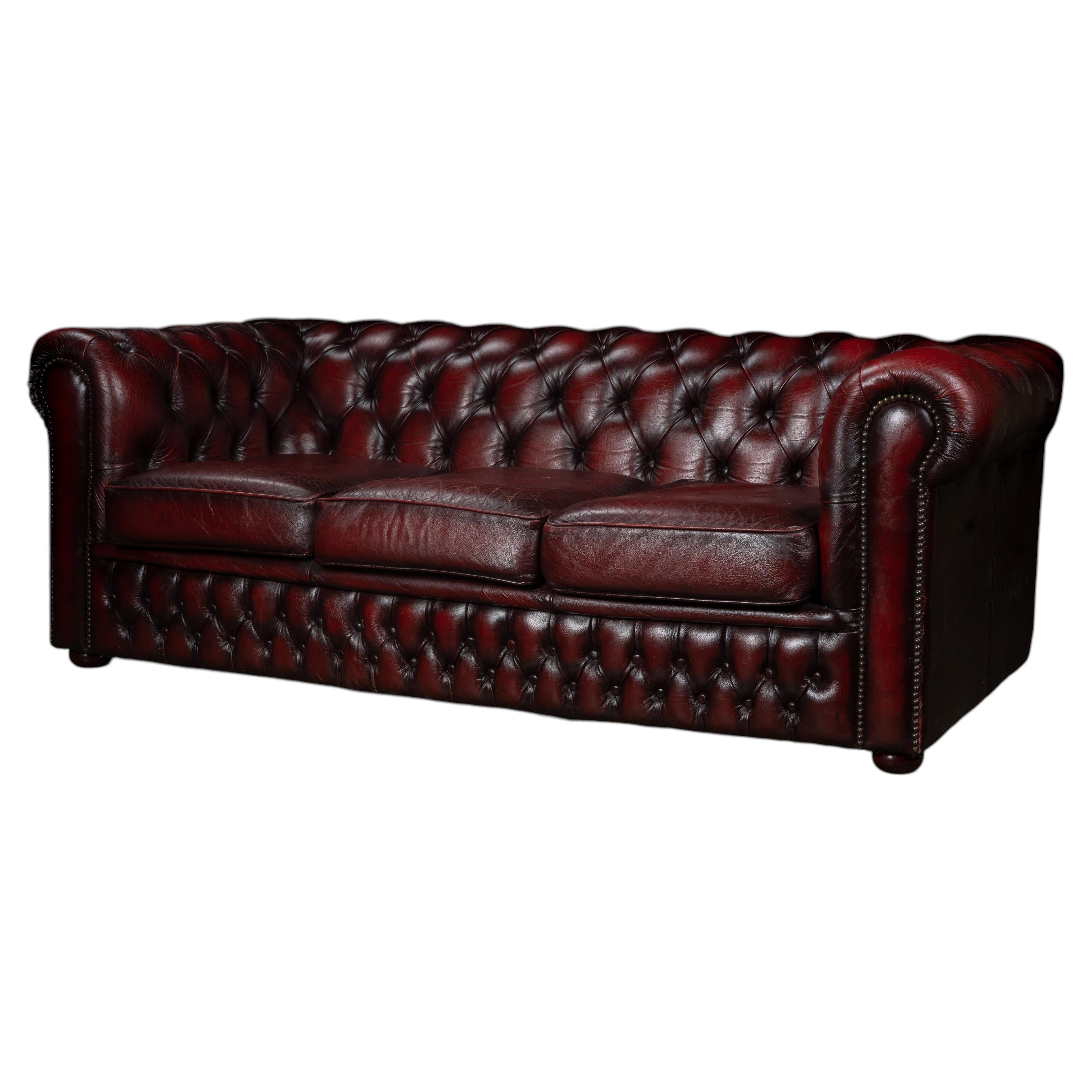 Vintage Tufted Leather Chesterfield Sofa in Oxblood For Sale