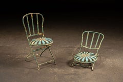 Pair of François Carré Wrought Iron "Sunburst" Folding Garden Chairs