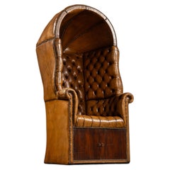 Antique Tufted Leather Porter’s Chair with Storage Base in Amber