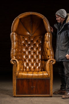 Antique Tufted Leather Porter’s Chair with Storage Base in Amber