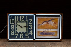 Orologio pubblicitario rotante al neon d'epoca di Electric Ad Clock