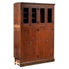 Antique Massive Oak Cabinet with Glass Doors and Interior Cubbies