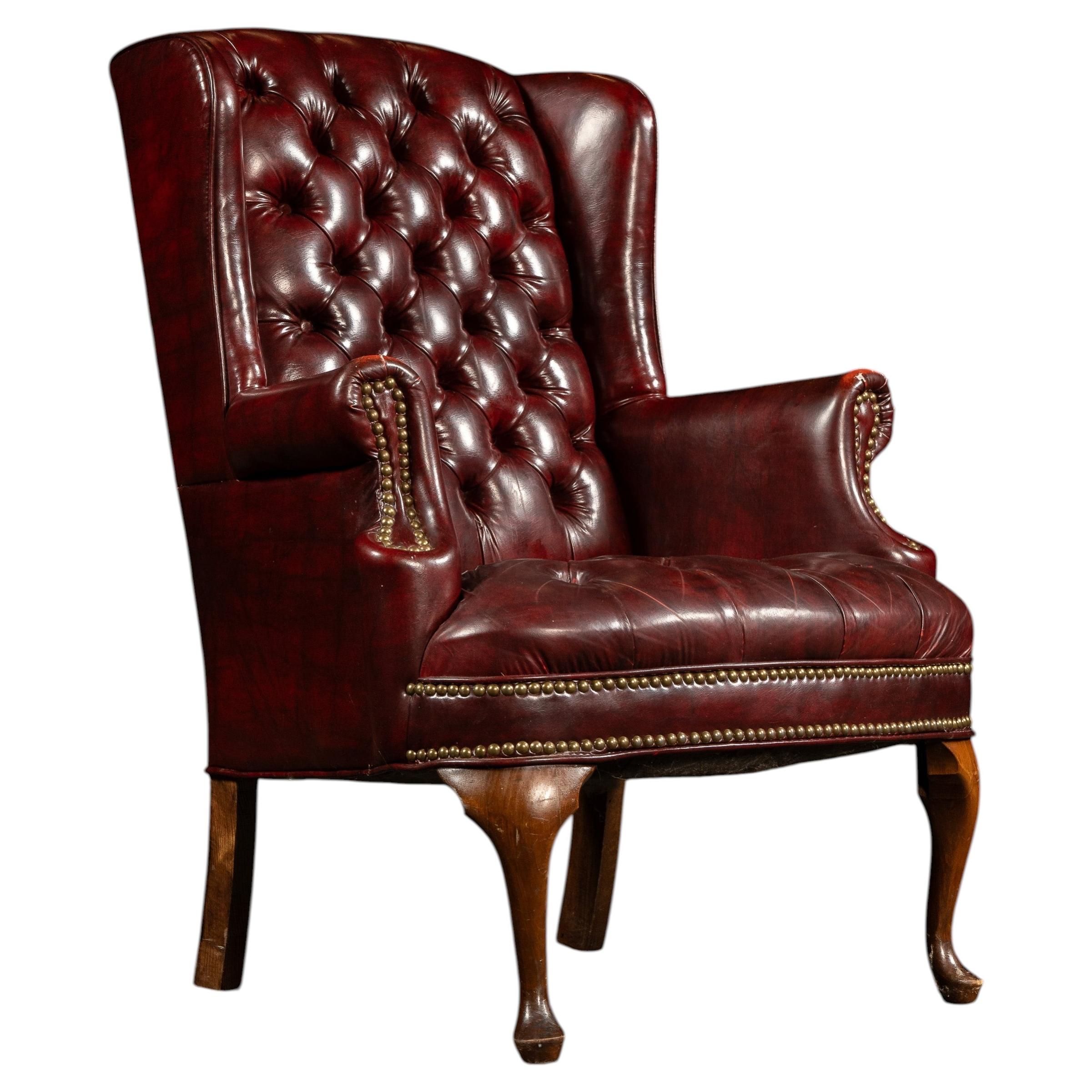 Vintage Tufted Leather Wingback Chesterfield Armchair in Oxblood For Sale