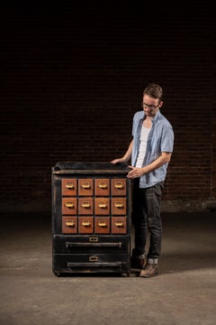 Antique Wooden 14 Drawer Rolling Shop Cabinet in Distressed Black